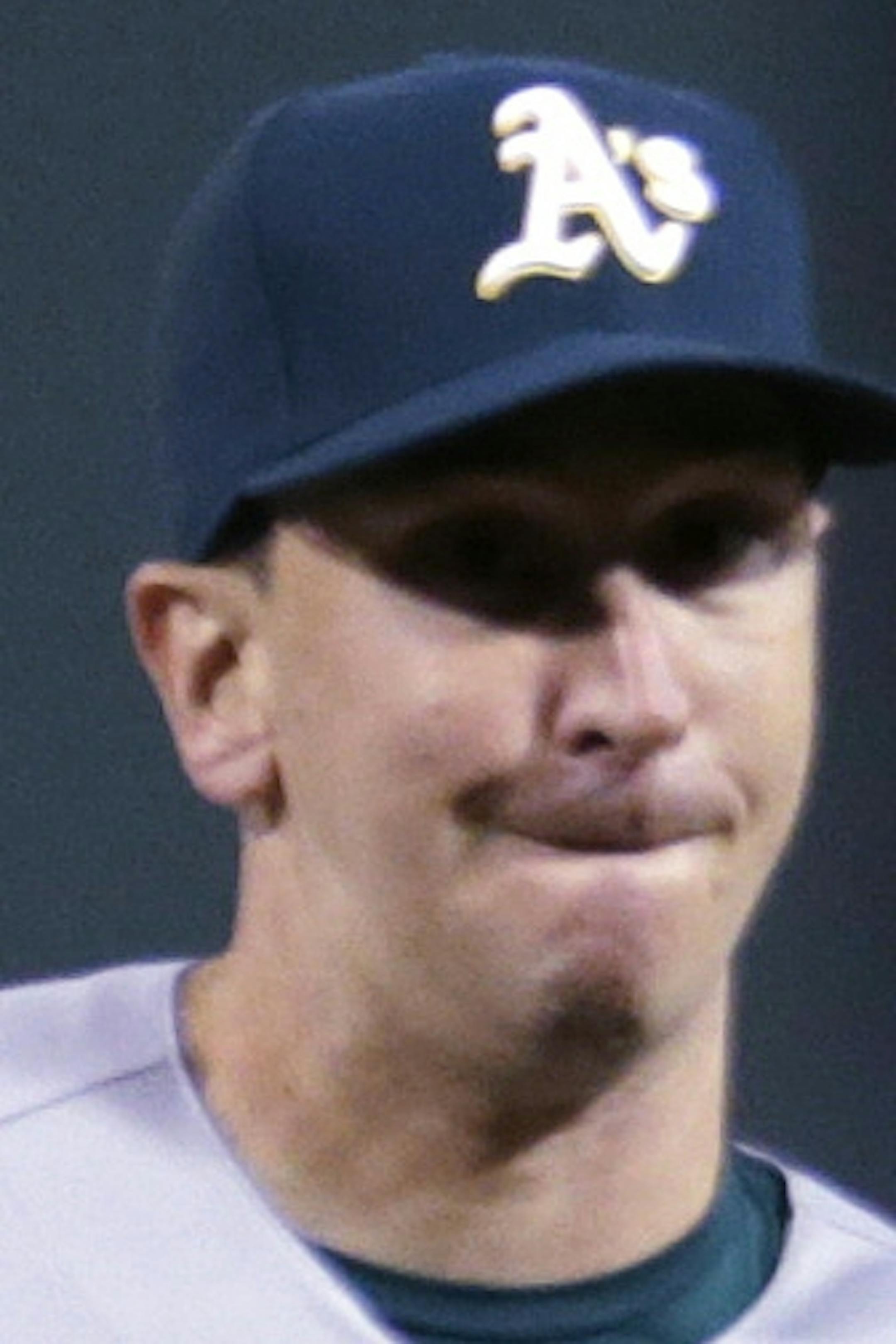 Oakland Athletics ambidextrous relief pitcher Pat Venditte (29) delivers to Boston Red Sox's Brock Holt in the seventh inning during a baseball game at Fenway Park in Boston, Friday, June 5, 2015. (AP Photo/Charles Krupa)