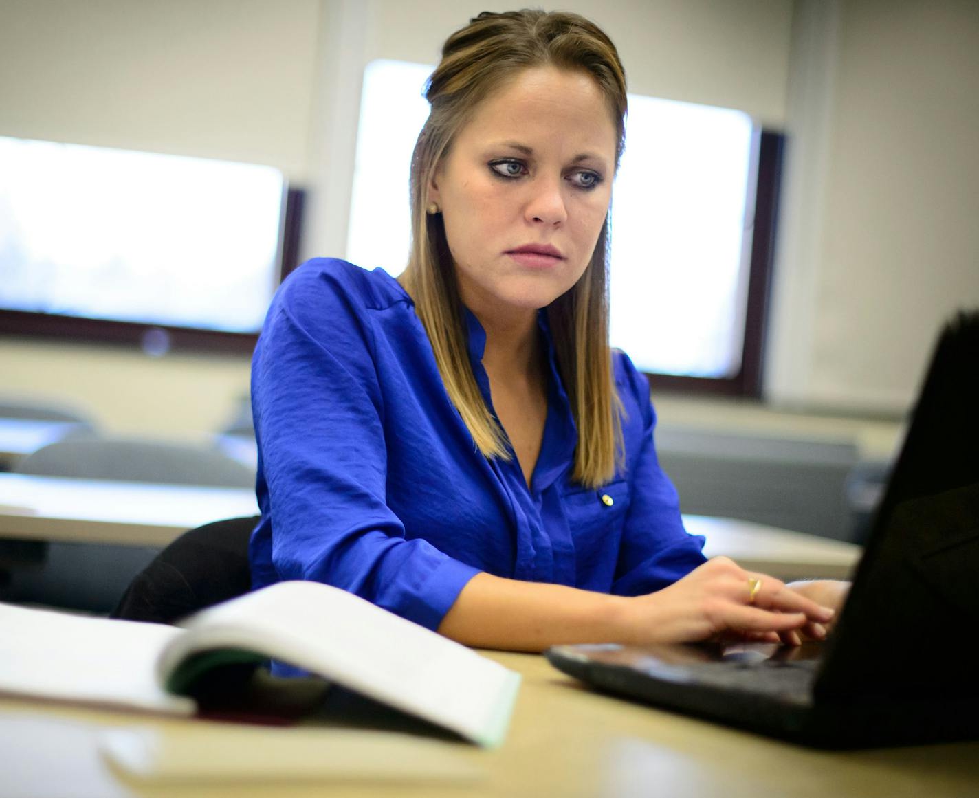 Meg Kelner, a third-year law student at William Mitchell College of Law, and president of the student bar association, took one of her final exams online on Tuesday on campus. William Mitchell is about to become the first accredited law school to allow students to take up to half their classroom hours online. Tuesday, December 17, 2013 ] GLEN STUBBE * gstubbe@startribune.com