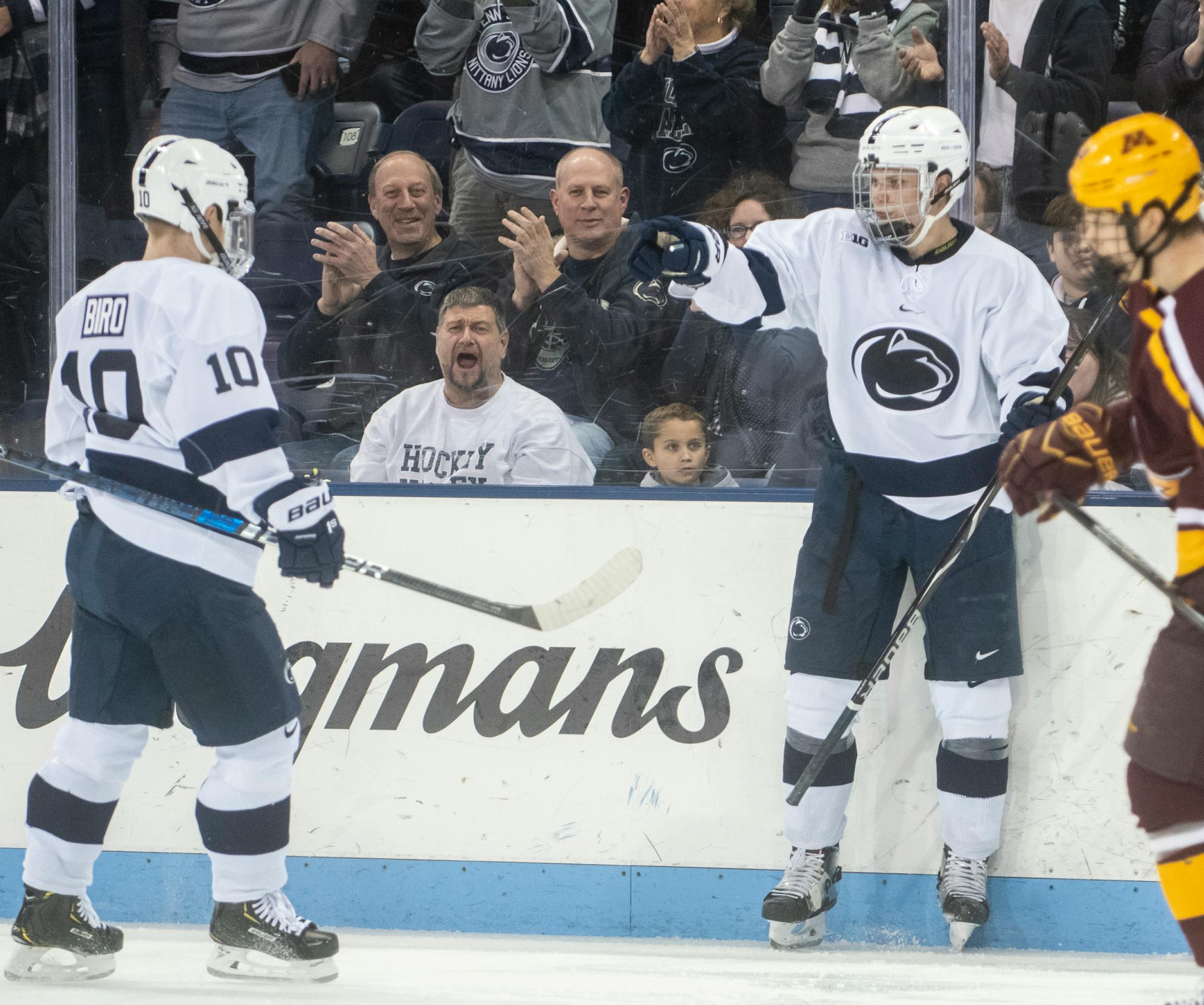 Penn State celebrated after a goal during a game against Minnesota at Pegula Ice Arena on Friday