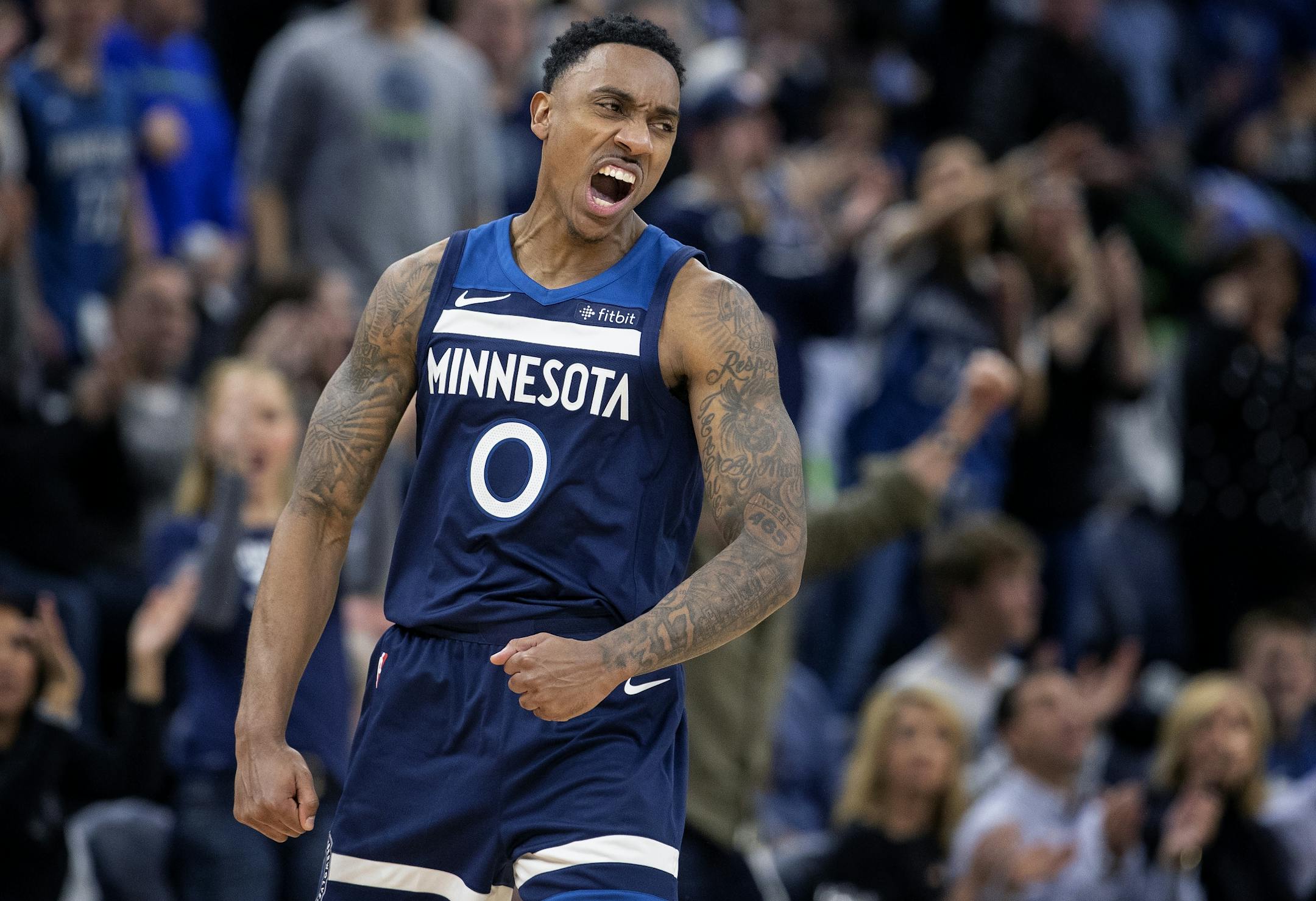 Minnesota Timberwolves Jeff Teague (0) reacted after scoring in the fourth quarter.