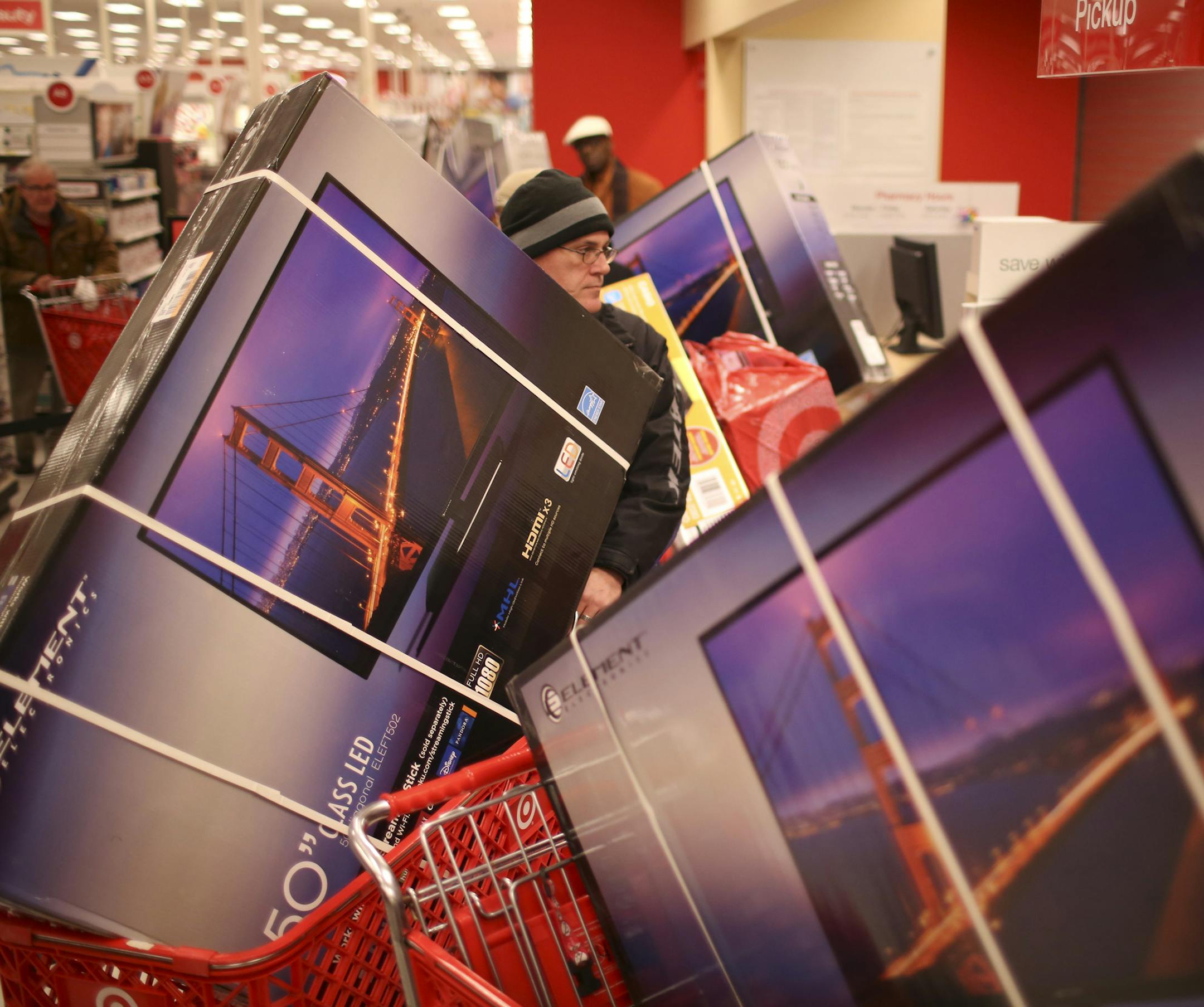 Hundreds of bargain hunters were in line to enter the Target store at Ridgedale when it opened at 8 p.m. on Thanksgiving Day. The pharmacy registers were devoted to checking out shoppers with televisions sets that were a feature of the pre-Black Friday sale.