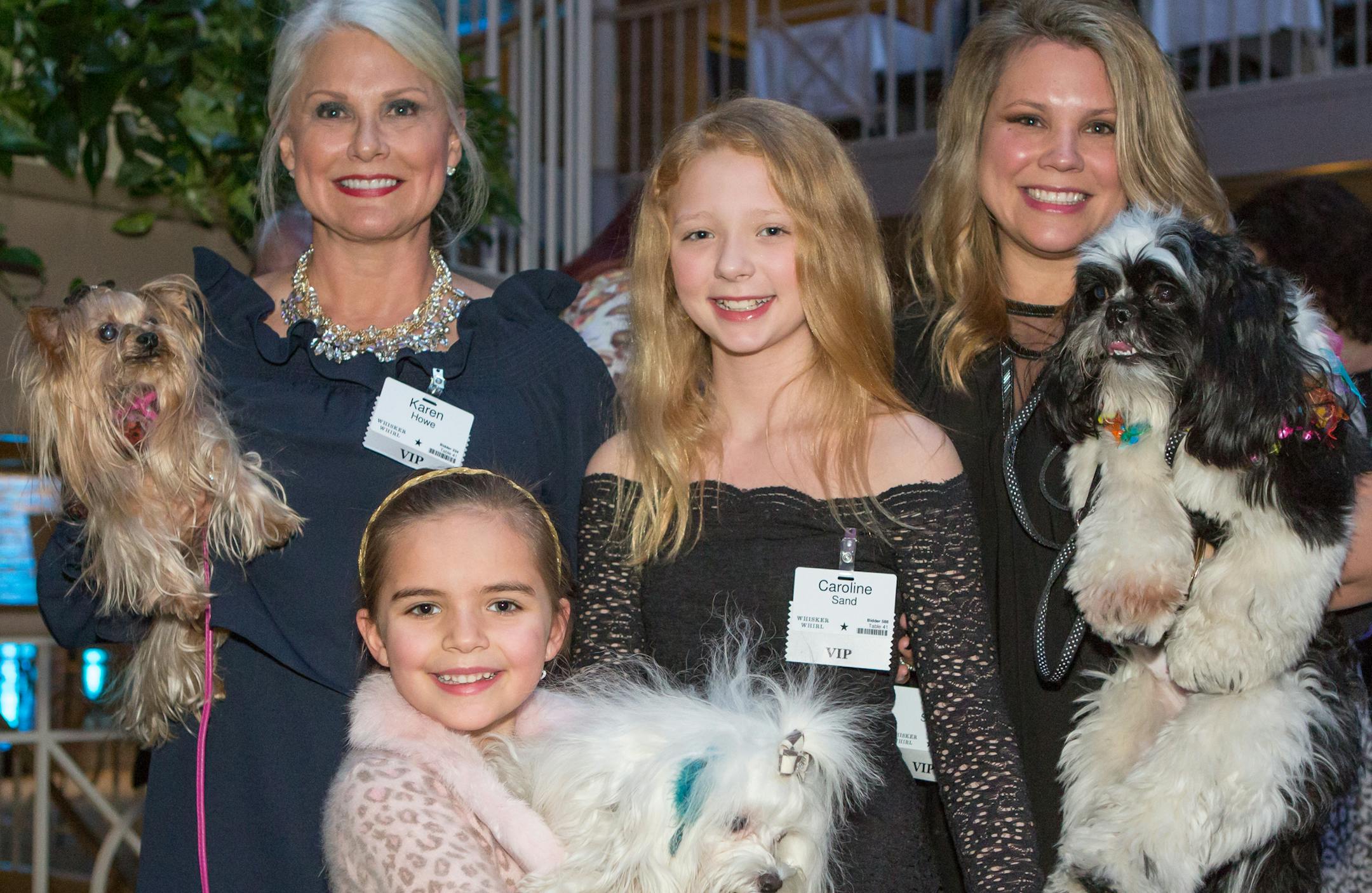 Karen Howe and Charlotte, Caroline and Liz Sand, with Phoebe, Casper and Oreo, attend Whisker Whirl. [ Special to Star Tribune, photo by Matt Blewett, Matte B Photography, matt@mattebphoto.com, February 25, 2017, Whisker Whirl: A Gala to benefit Animal Humane Society, International Market Square, Minneapolis, Minnesota, SAXO FACE031217 1002866434
