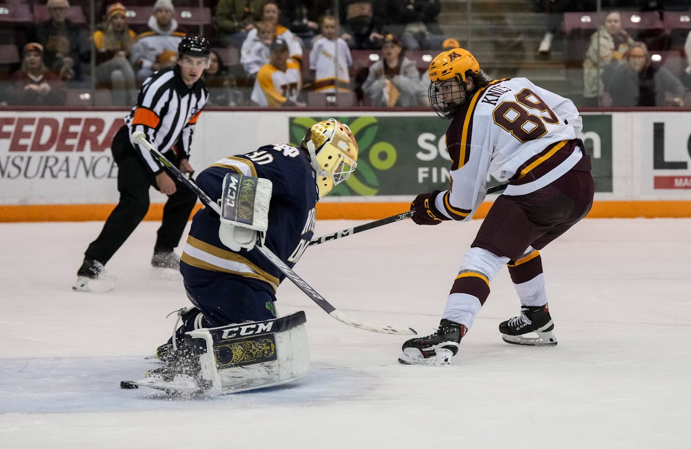 Minnesota forward Matthew Knies (89) gets the puck between Notre Dame goaltender Ryan Bischel's (30) legs for a goal in the second period. The Minnesota Gophers hosted the Notre Dame Fighting Irish at 3M Arena at Mariucci on Friday, Nov. 4, 2022 in Minneapolis, Minn. ] RENEE JONES SCHNEIDER • renee.jones@startribune.com