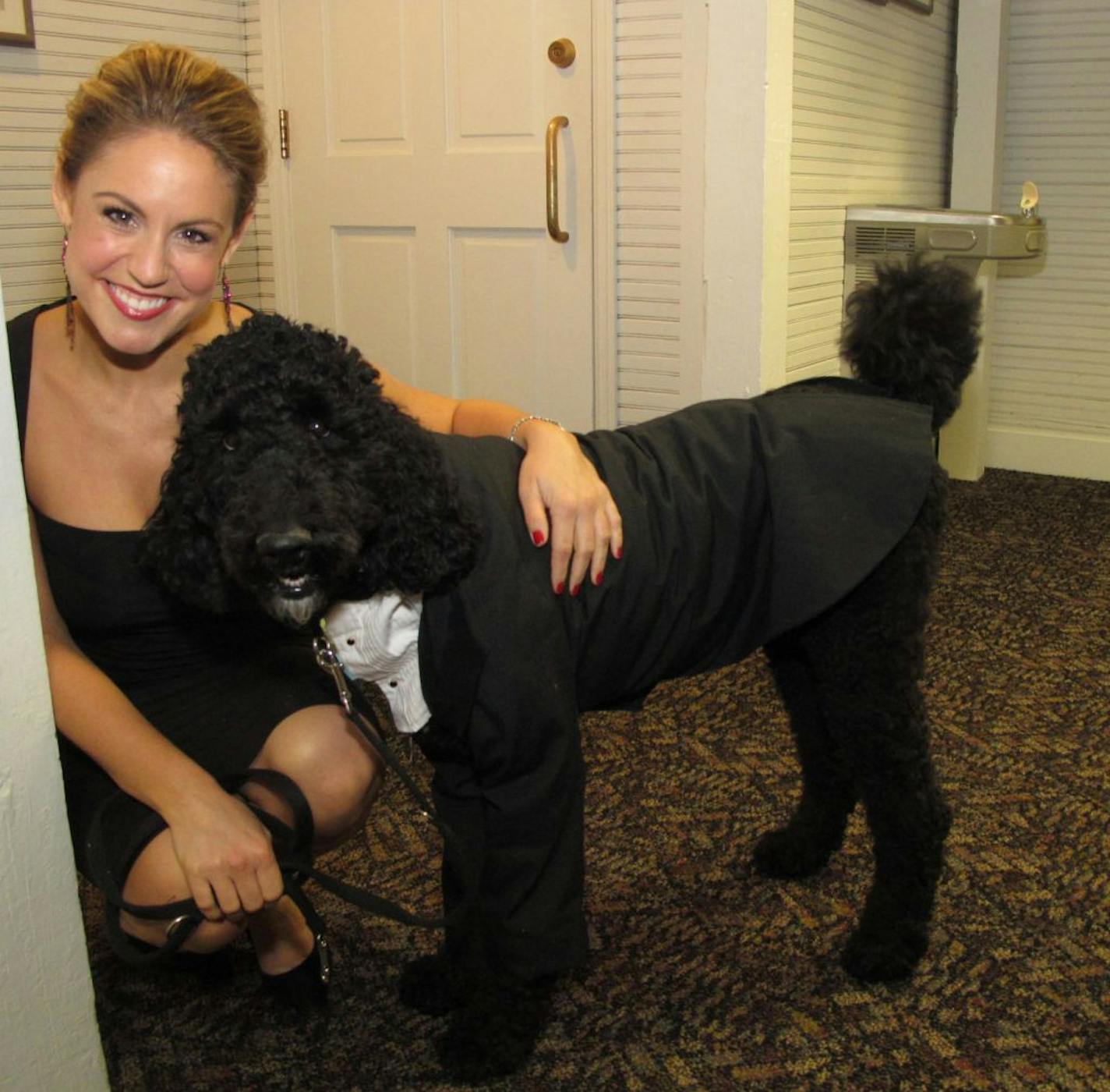 Can Do Canine's Fetching Ball Gala included a fashion show of service dogs-in-training. Natalie Kane of WCCO-TV and trainee Rufus.