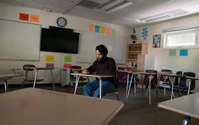 Saheb Gulati, a senior headed to Stanford University, scrolls his Instragram feed last week at Sacramento Country Day School.