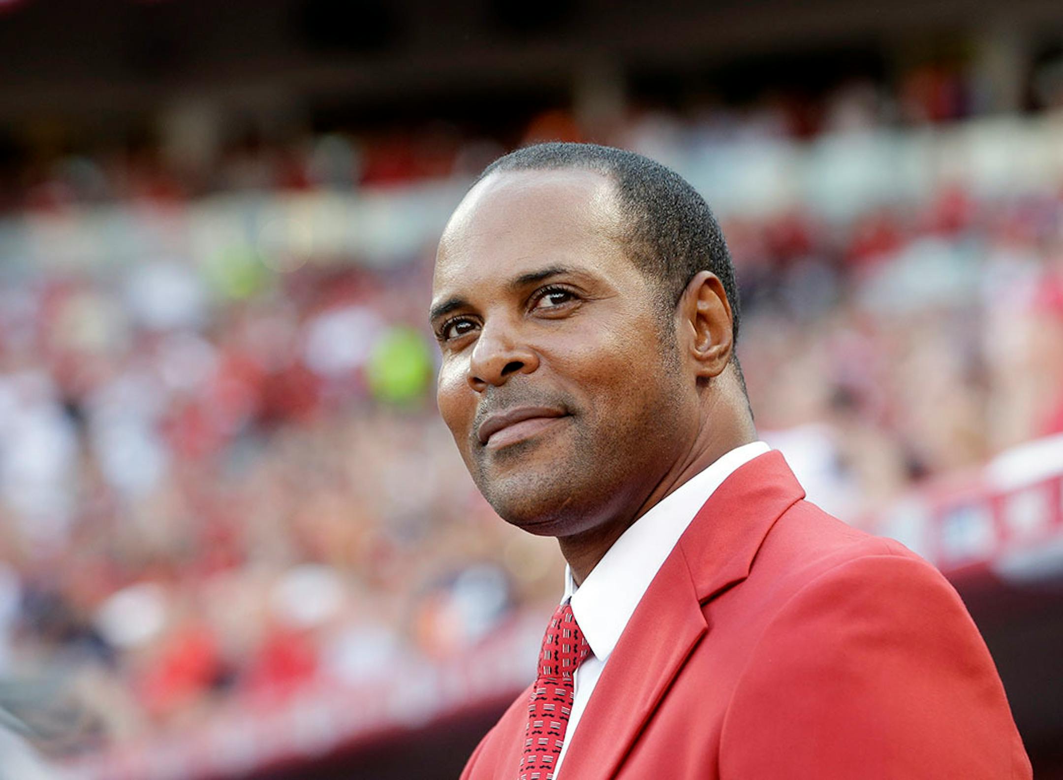 Barry Larkin is introduced before the MLB All-Star baseball game, Tuesday, July 14, 2015, in Cincinnati. (AP Photo/John Minchillo)
