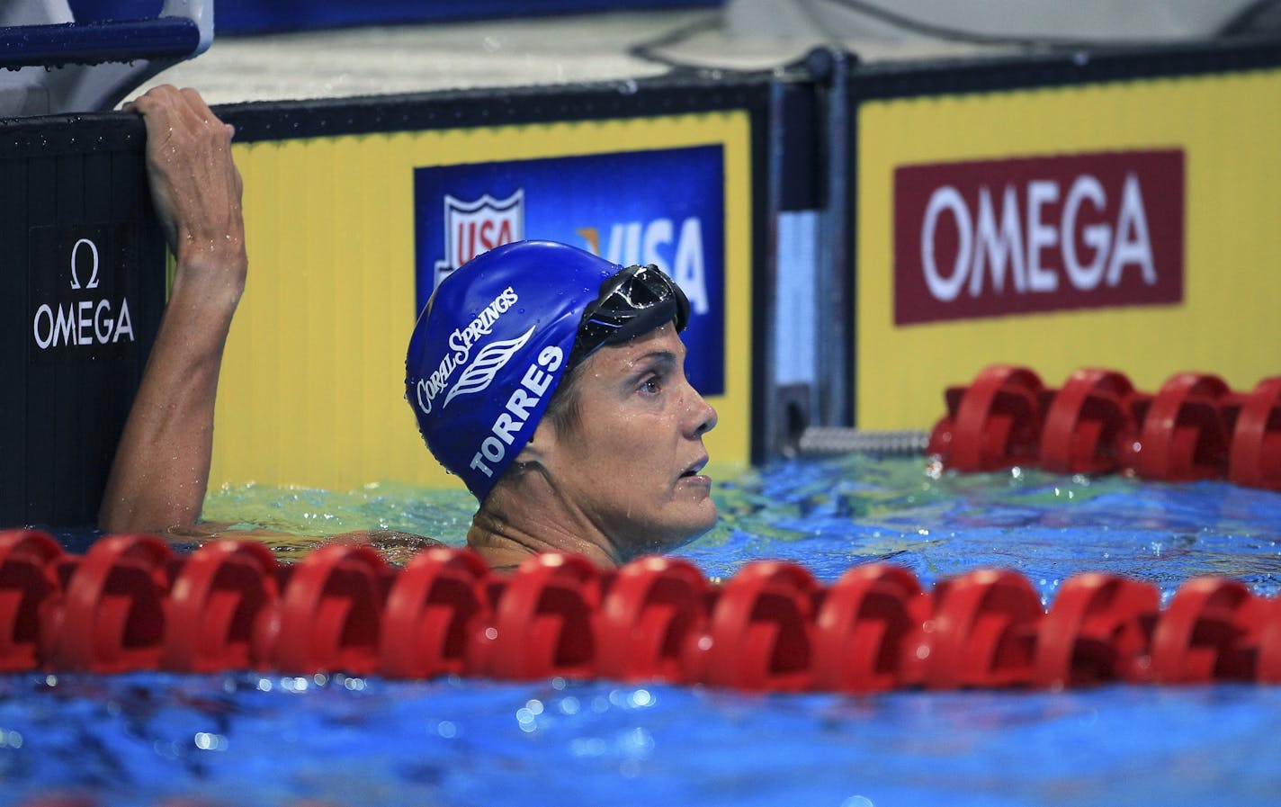 Dara Torres checks the clock after swimming the women's 50 freestyle during the morning heats at the U.S. Olympic trials in Omaha, Neb., July 1, 2012. Torres finished fifth with a time of 25 seconds and will move on to the semifinals. At 45, she is trying to become the first American to swim in six Olympics.