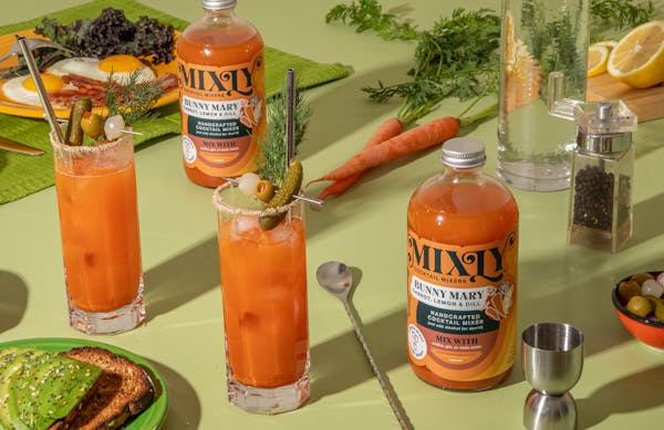 Mixly's Bunny Mary cocktail mixer is a base of carrot juice with lemon and dill notes, garnished with pickles, onion and olives.