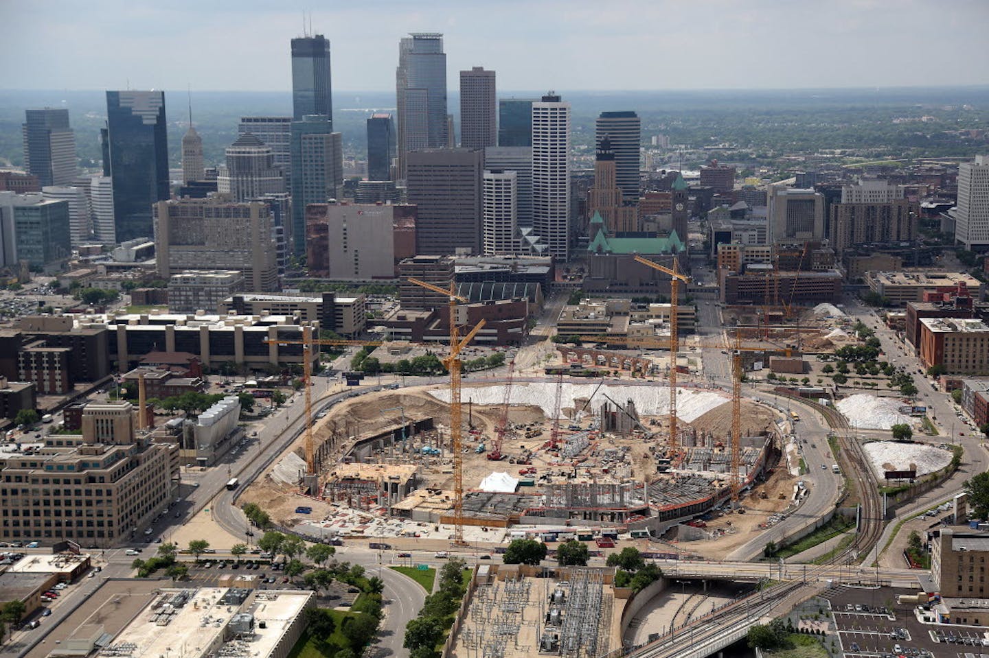 June 27, 2014: Construction of the new Vikings stadium against the Minneapolis skyline.