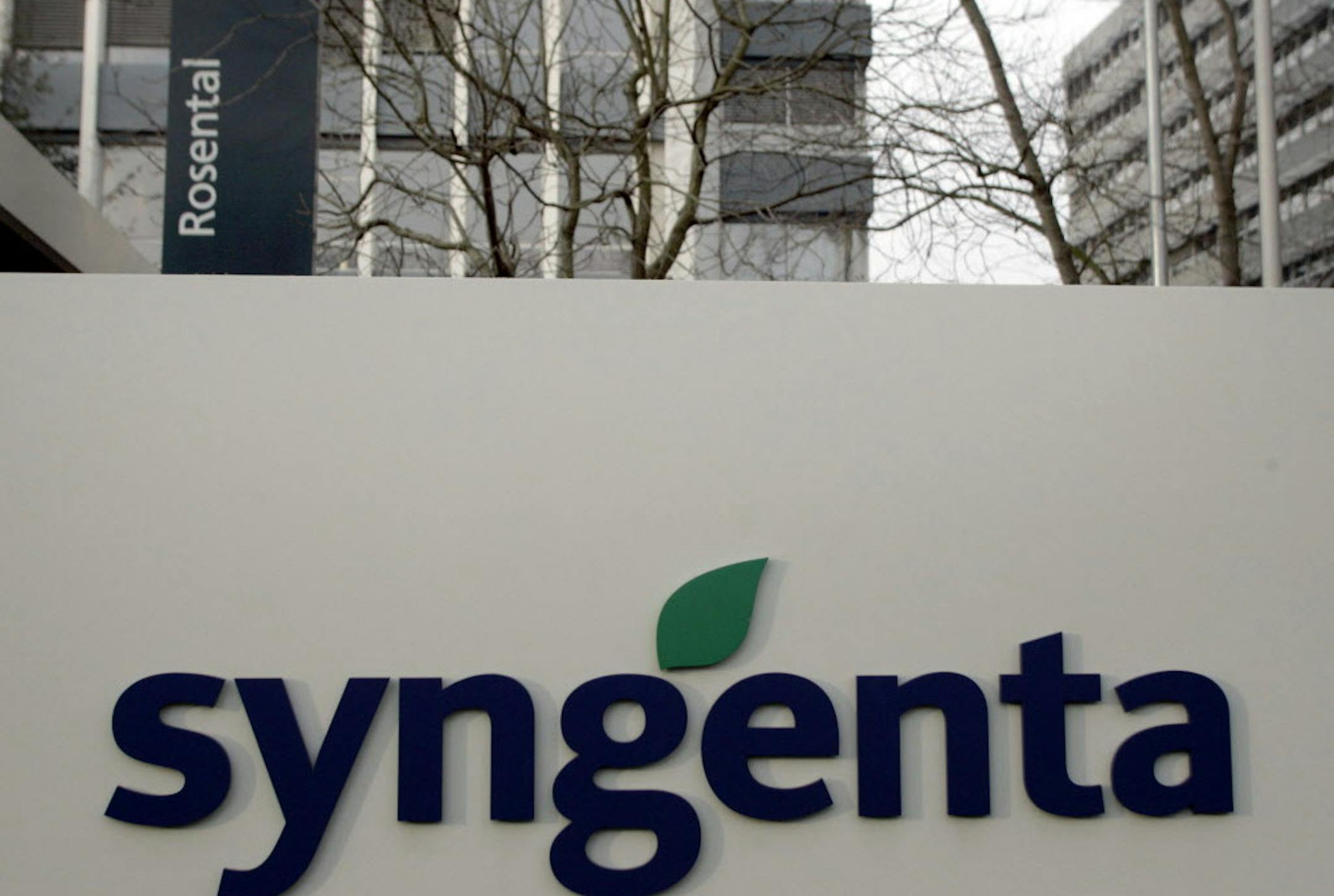 FILE - In this Feb. 7, 2007 file photo the headquarters and logo of the Swiss chemical maker Syngenta is pictured in Basel, Switzerland. The number of farmers filing lawsuits against agrochemicals giant Syngenta is growing in a legal fight that centers on the sale of a genetically modified corn seed the company developed. (AP Photo/Keystone, Georgios Kefalas, file)