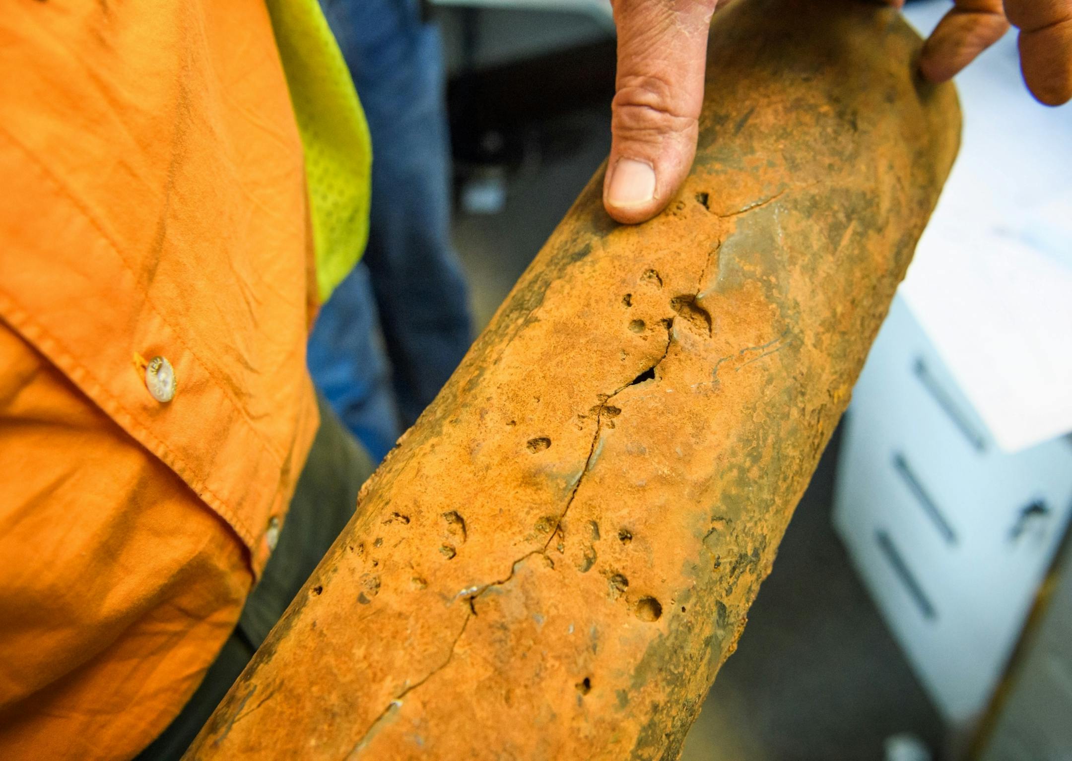 Daniel Berg, utility operations supervisor held examples of underground fresh water pipes damaged by electrolysis in Duluth.