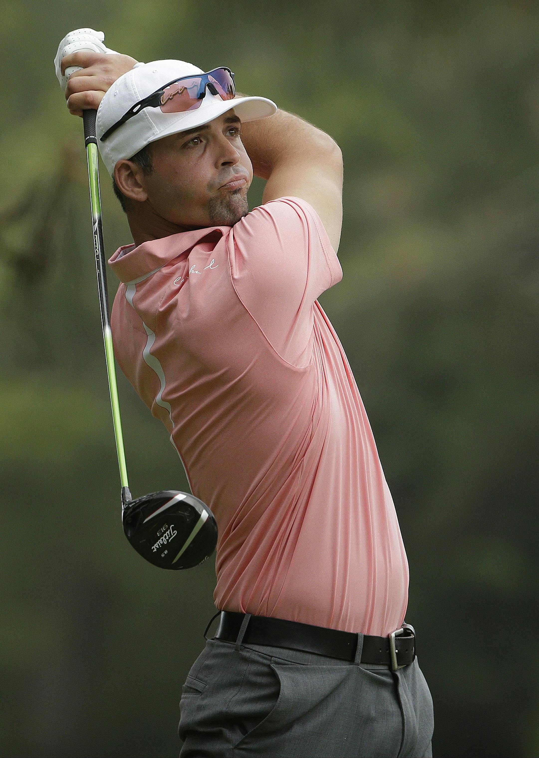 Clayton Rask watches his tee shot on the second hole during the first round of the U.S. Open golf tournament in Pinehurst, N.C., Thursday, June 12, 2014. (AP Photo/Chuck Burton) ORG XMIT: NCCC