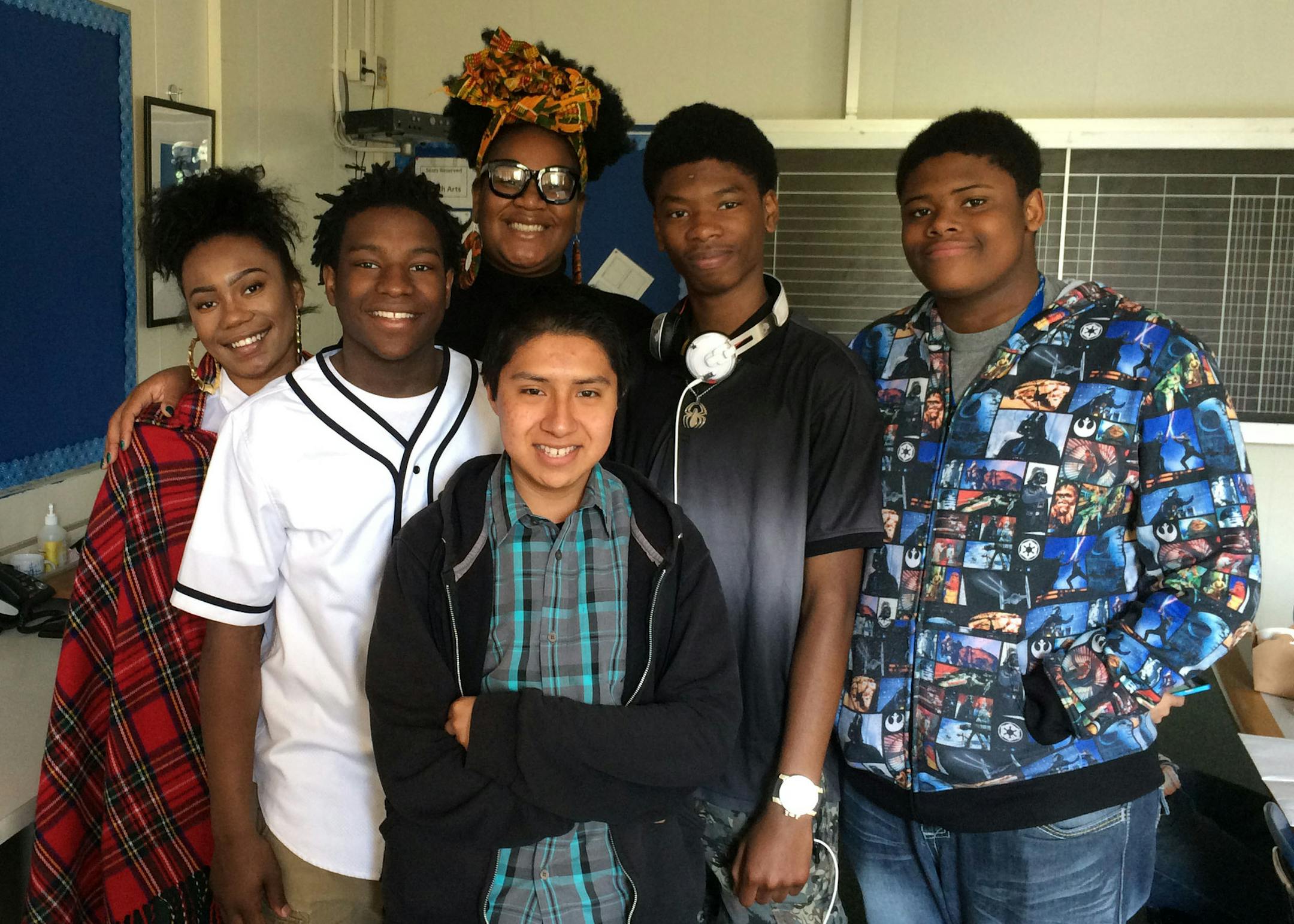 North High students challenge gentrification with a winning documentary From left: Kymari Love, Glenn Carter, teacher Courtney Bell, Miguel Rodriguez (front), Edward Beamon, Jaylon Oglesby
