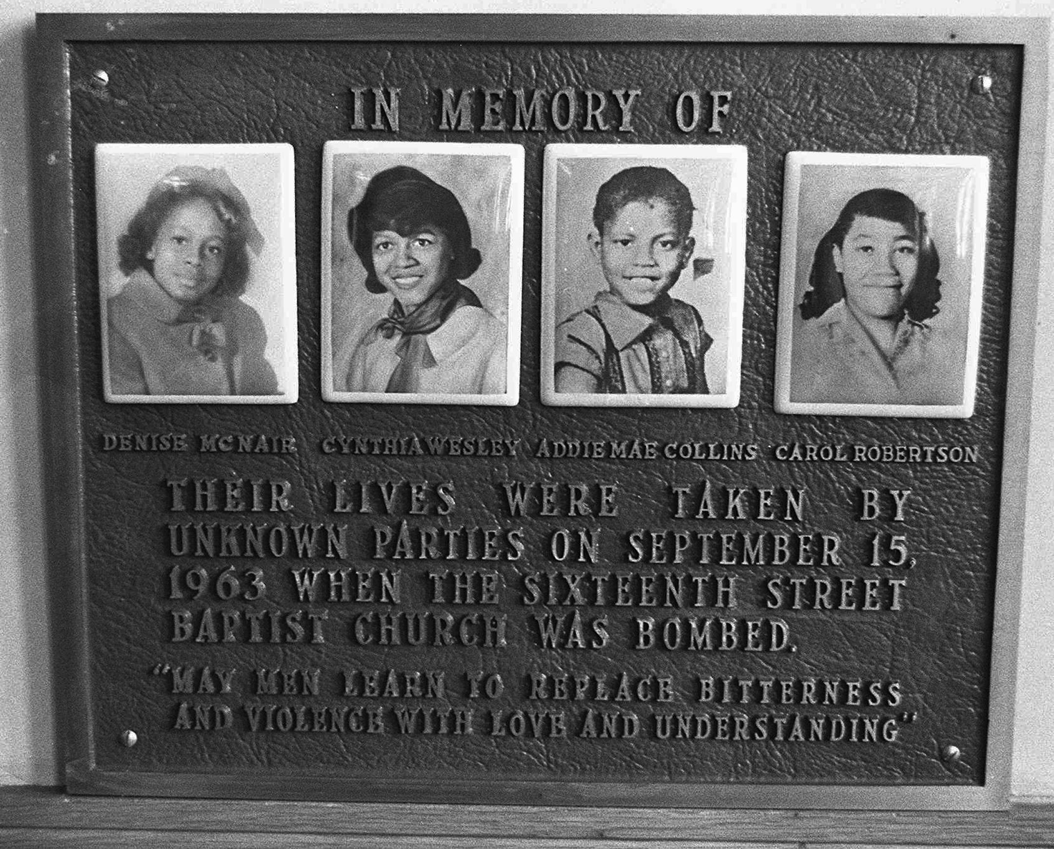 This is an undated file photo of a plaque outside of the Sixteenth Street Baptist Church in Birmingham, Ala., showing the four girls who were killed in a 1963 bombing at the church. The FBI has reopened its investigation of the bombing after a secret, year-long investigation of the case. (AP Photo/Birmingham News, FILE) ORG XMIT: MIN2013051008345611
