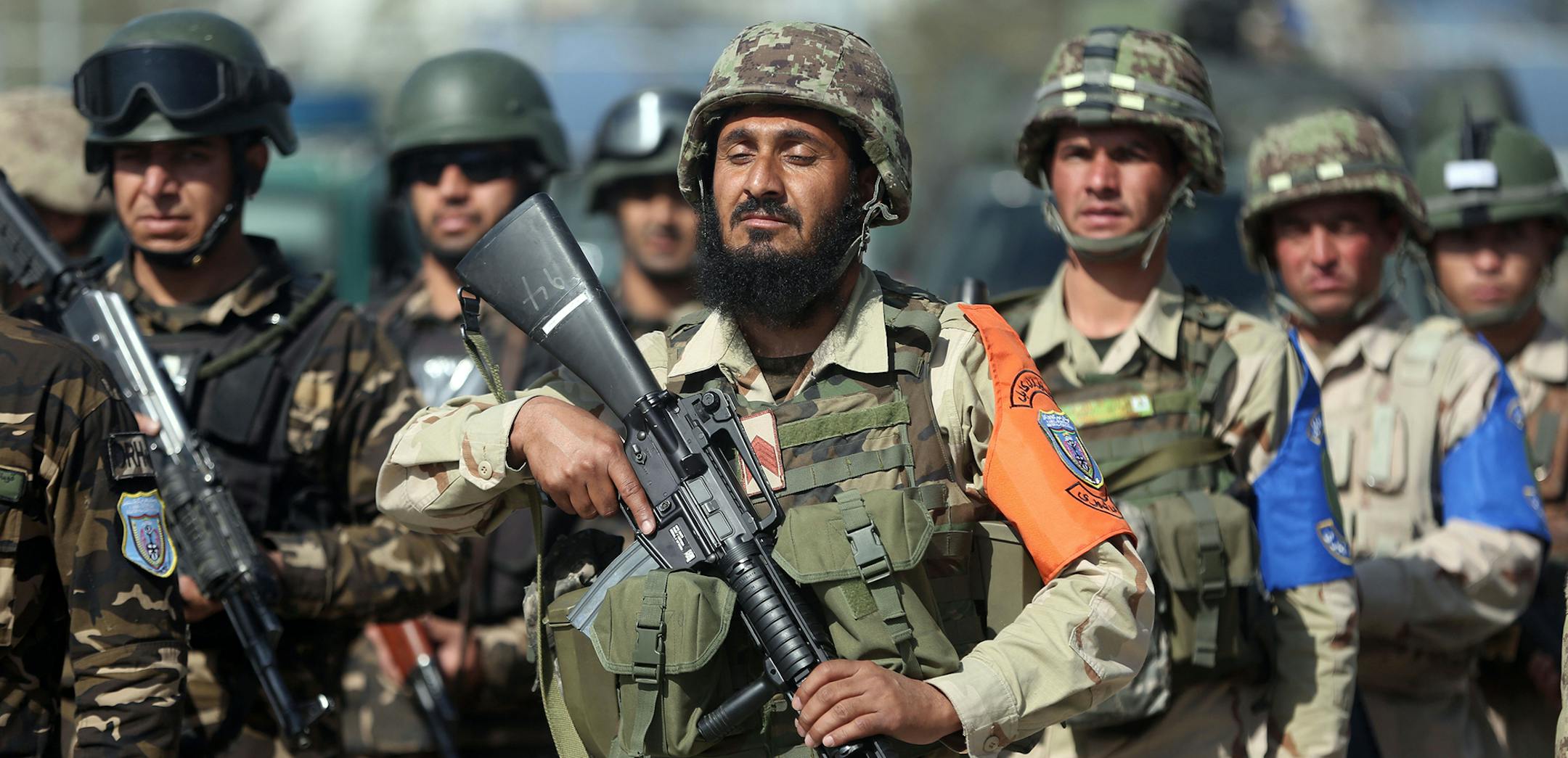 Afghan security forces take part in an exercise in Kabul Garrison compound, in Kabul, Afghanistan, Wednesday, Oct. 7, 2015. Afghan security forces (Army, police and intelligence service) are preparing for a security mission in Kabul city inside the Afghan Garrison General Command center, Afghan security forces in Kabul Garrison conduct their operations within Kabul province. (AP Photos/Massoud Hossaini) ORG XMIT: MIN2015100713274831