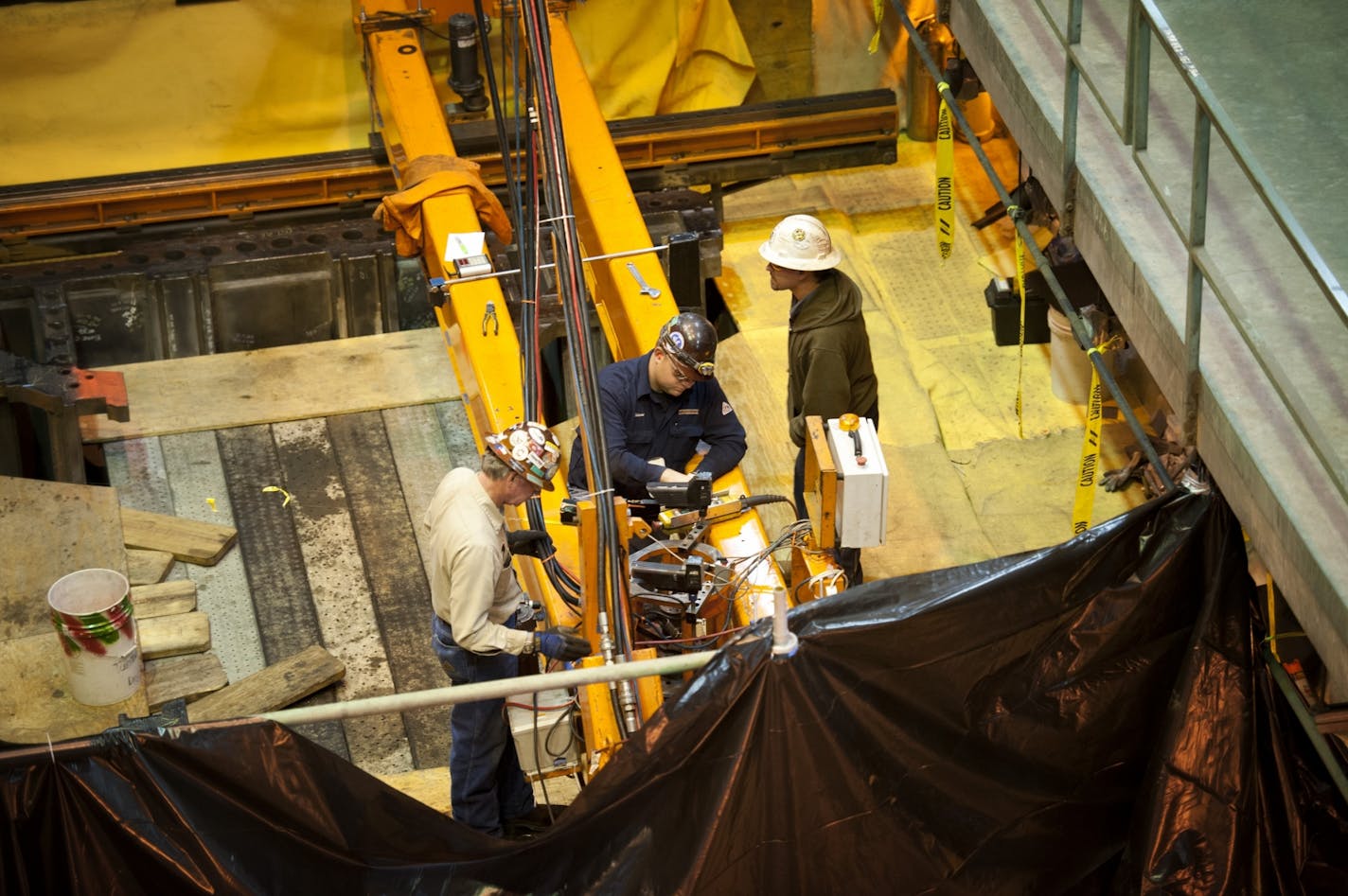 Though officials are still uncertain what caused the catastrophic failure of the turbine, workers at the Sherburne County plant are putting the state's largest electric generator back together.