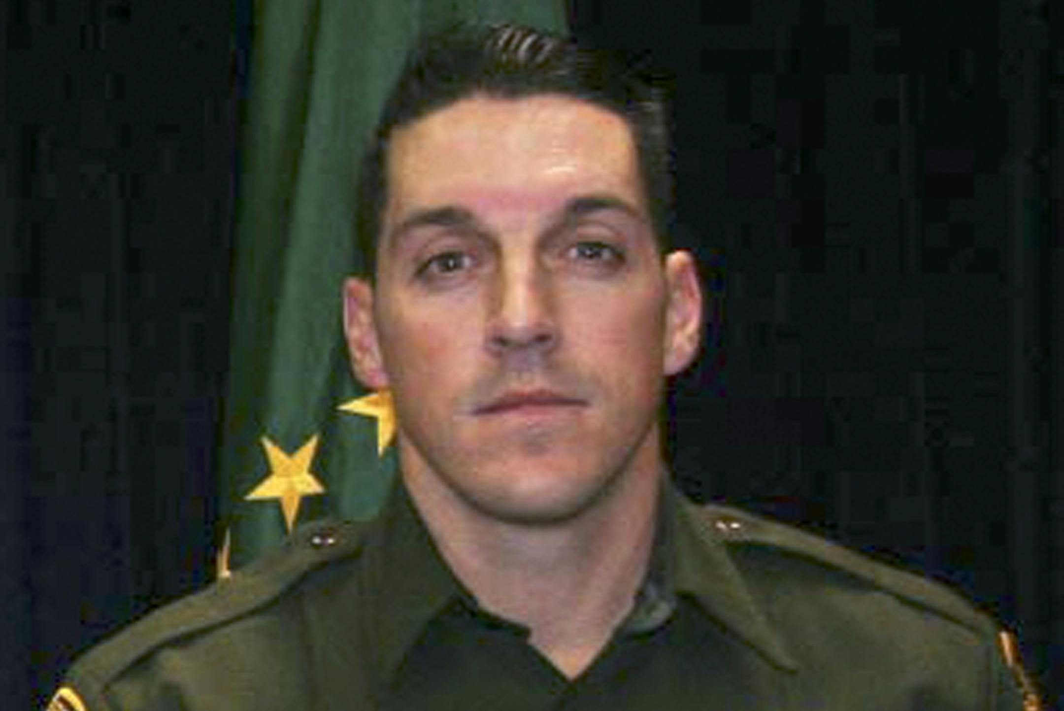 FILE - This undated photo provided by U.S. Customs and Border Protection shows U.S. Border Patrol agent Brian A. Terry. Terry was killed in a 2010 firefight near the Arizona-Mexico border between U.S. agents and five men who had sneaked into the country to rob marijuana smugglers. On Monday Nov. 18, 2013 a judge dismissed federal employees from a wrongful death lawsuit filed by the family of the slain Border Patrol agent over the botched "Fast and Furious" gun operation. (AP Photo/U.S. Customs a