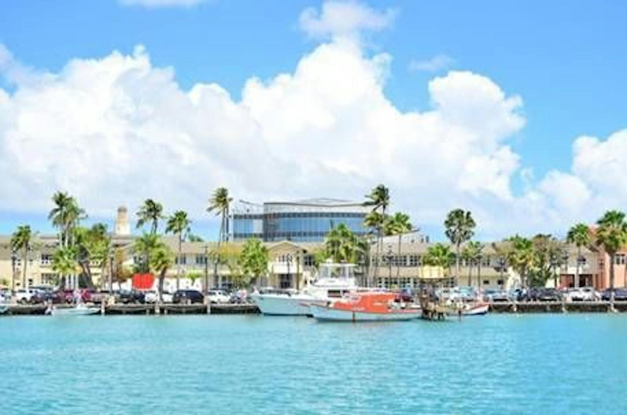 The capital of Aruba is Oranjestad, a colorful, cultural center with boats, shops, restaurants, and the iconic I Love Aruba sign.