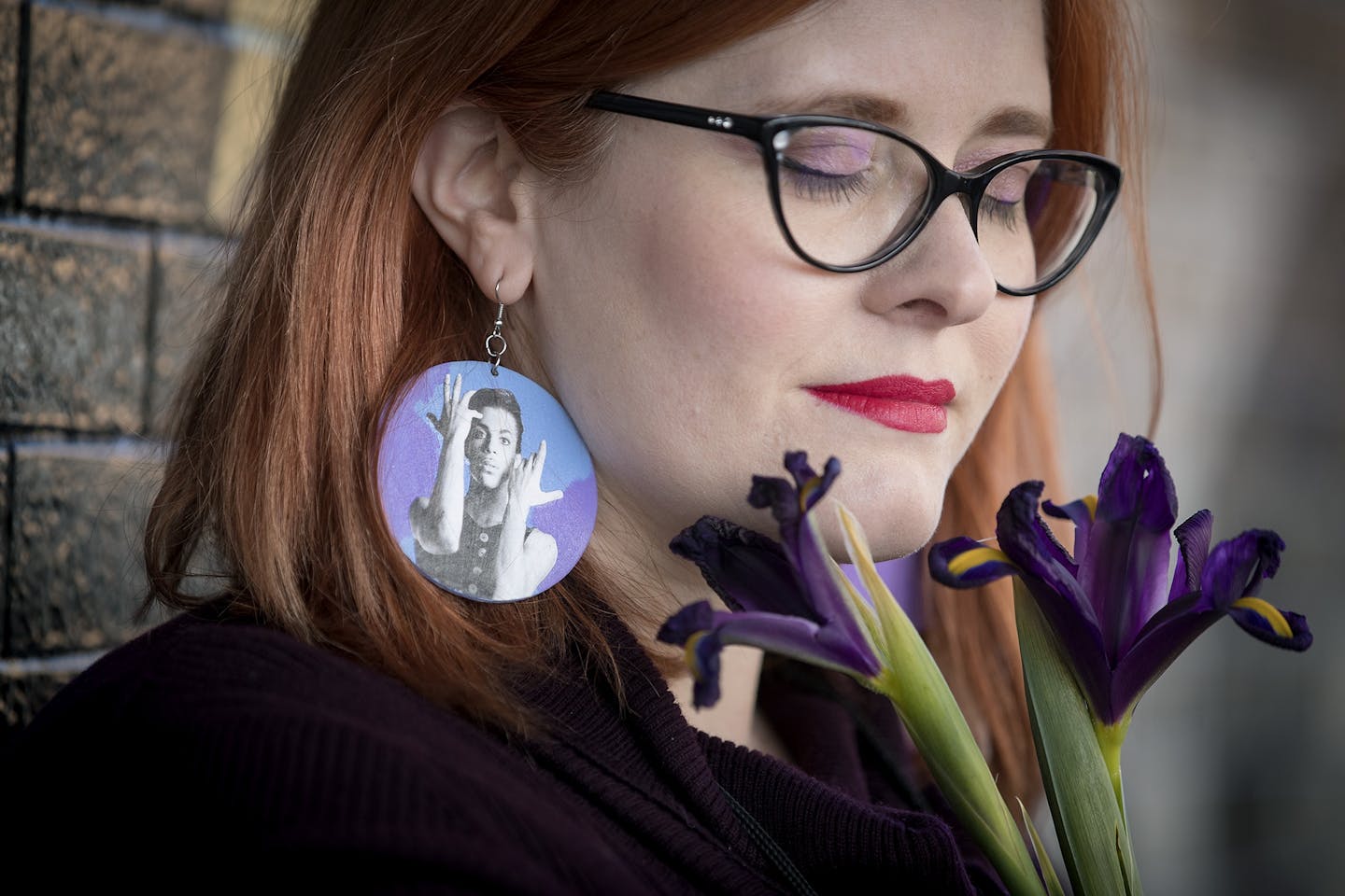 "My mom used to sing me Prince songs," said Katie Starks as she visited the Prince star Friday at First Avenue to remember him on the first anniversary of his death.