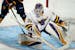 Minnesota State goaltender Dryden McKay looks to stop a Quinnipiac shot during the second period of an NCAA West Regional college hockey semifinal Sat