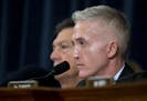 House Benghazi Committee Chairman Rep. Trey Gowdy, R-S.C. listens as Democratic presidential candidate, former Secretary of State Hillary Rodham Clint