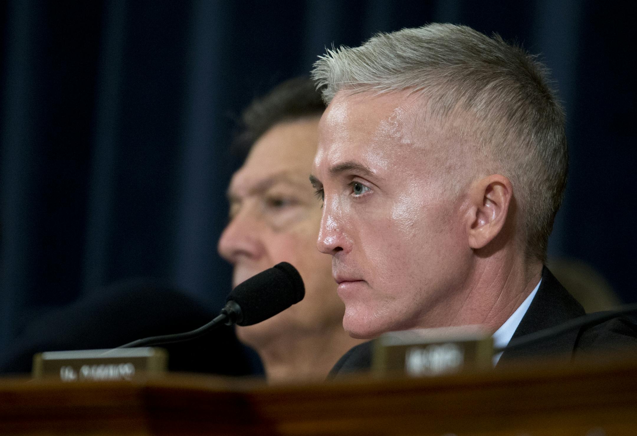 House Benghazi Committee Chairman Rep. Trey Gowdy, R-S.C. listens as Democratic presidential candidate, former Secretary of State Hillary Rodham Clinton testifies before the committee on Capitol Hill in Washington, Thursday, Oct. 22, 2015.