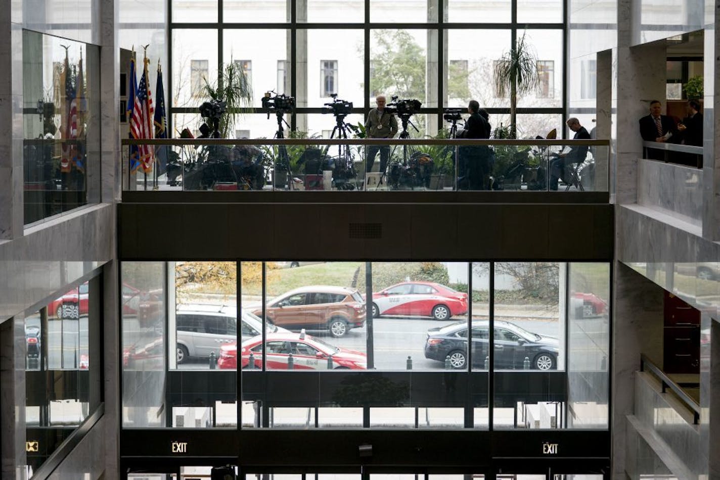 Members of the media are lined up outside the Senate office of Sen. Al Franken, D-Minn., on Capitol Hill, Wednesday, Dec. 6, 2017, in Washington. Sen. Kirsten Gillibrand, D-N.Y., and fellow female Democratic senators have united in calling for SFranken to resign amid sexual misconduct allegations.