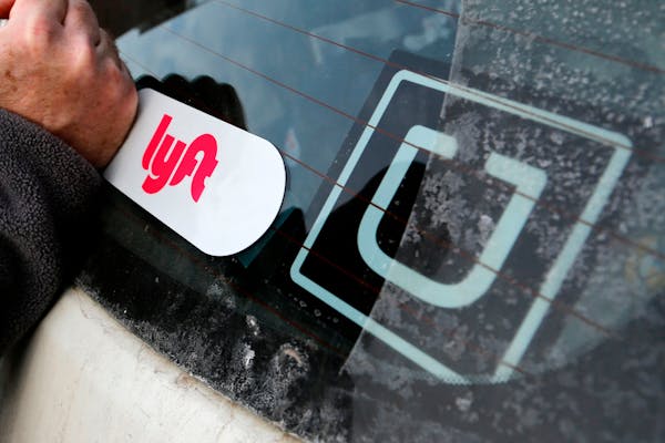 Uber and Lyft threatened to leave Minneapolis or curtail services if Mayor Jacob Frey signed the plan.