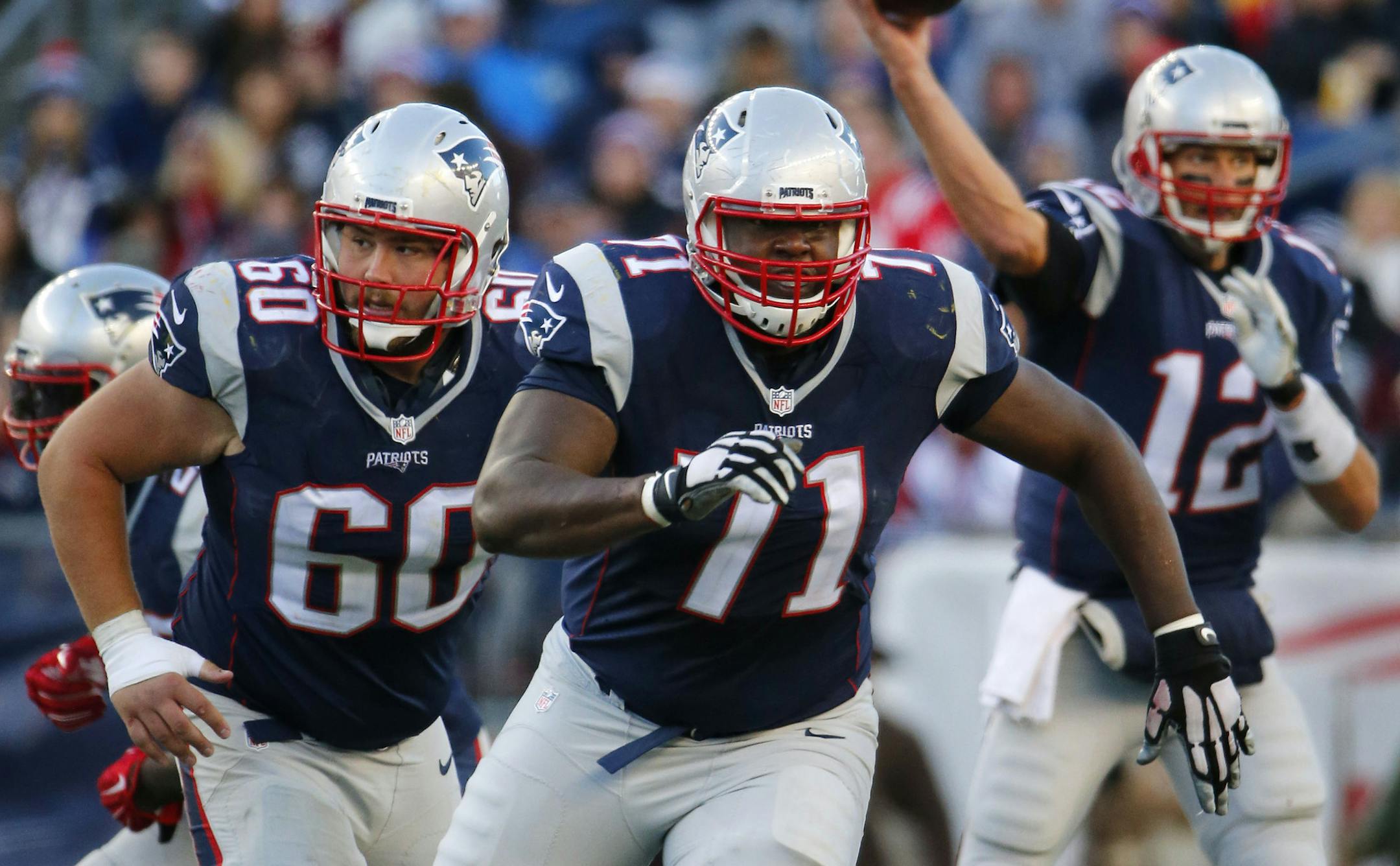 New England Patriots center David Andrews (60) and offensive tackle Cameron Fleming (71) break downfield to block against the Washington Redskins during a NFL football game at Gillette Stadium in Foxborough, Mass. Sunday Nov. 8, 2015. (Winslow Townson/AP Images for Panini) ORG XMIT: FBO10
