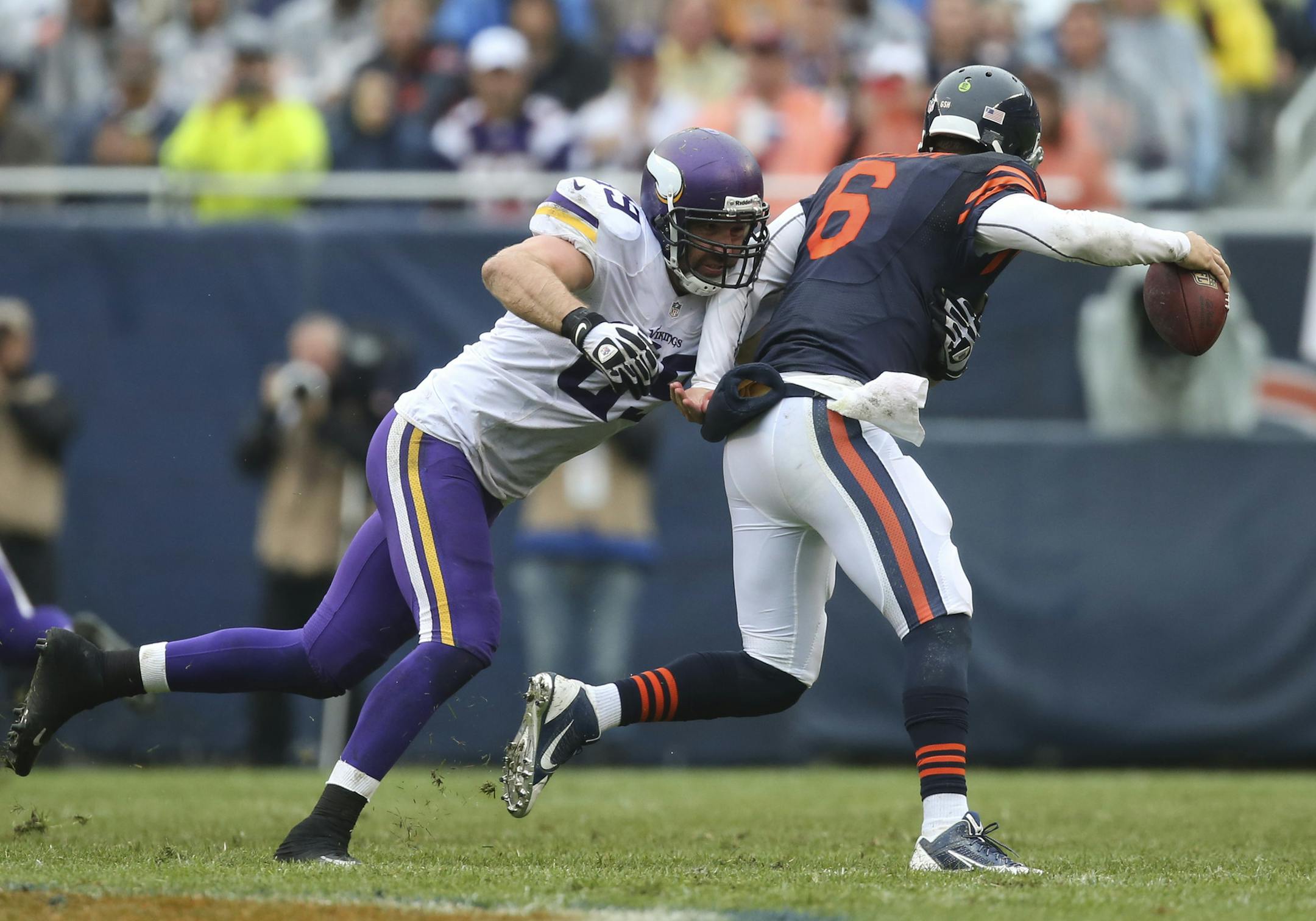 Minnesota Vikings defensive end Jared Allen (69) closed in on Chicago Bears quarterback Jay Cutler (6)