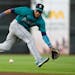 Mariners second baseman Jorge Polanco fielded a grounder against Houston on Sunday. Polanco has gotten off to a slow start with his new team since his