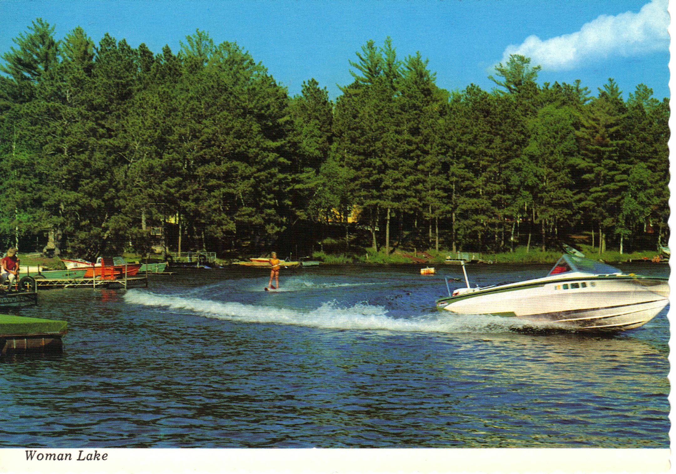 This vintage photograph captures the Green family enjoying one of its favorite activities on Woman Lake.