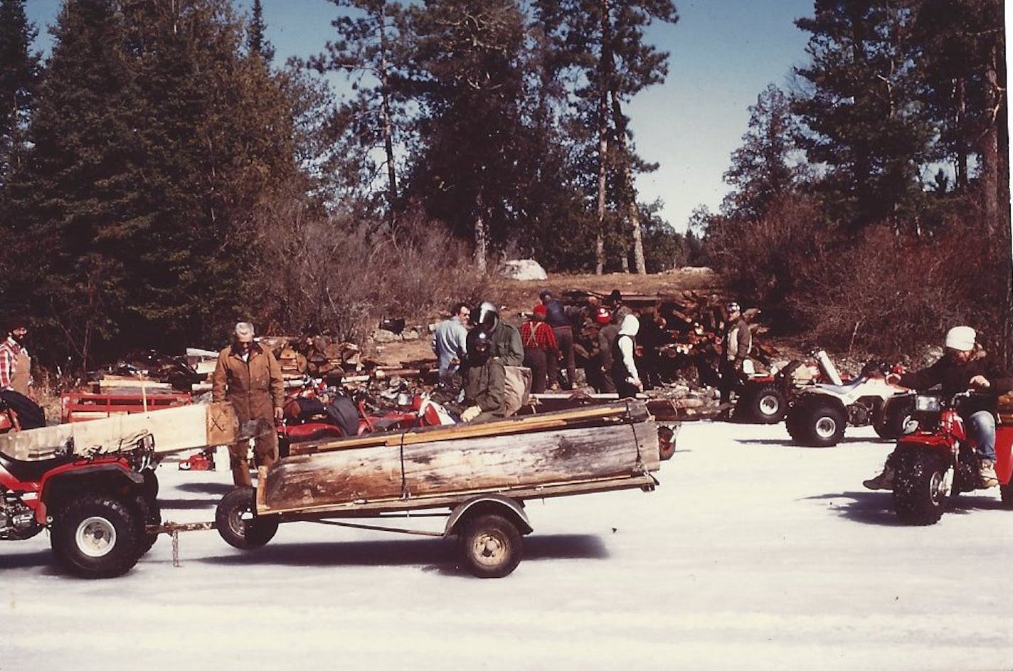 Workers gathered up Dorothy Molter's cabin for preservation from her perch on a Knife Lake island