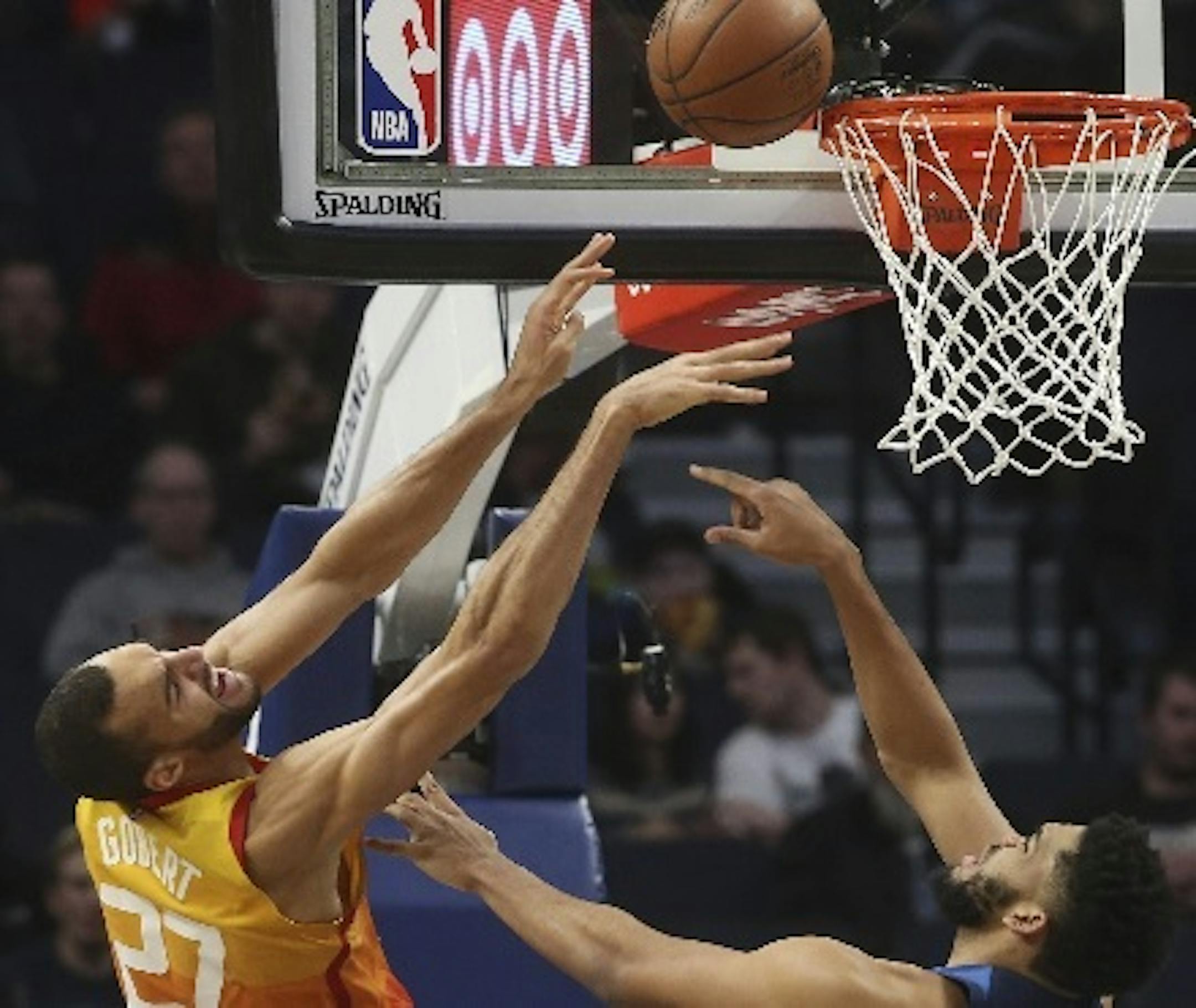 Wolves center Karl-Anthony Towns broke up a shot attempt by Utah's Rudy Gobert in the second half Sunday.