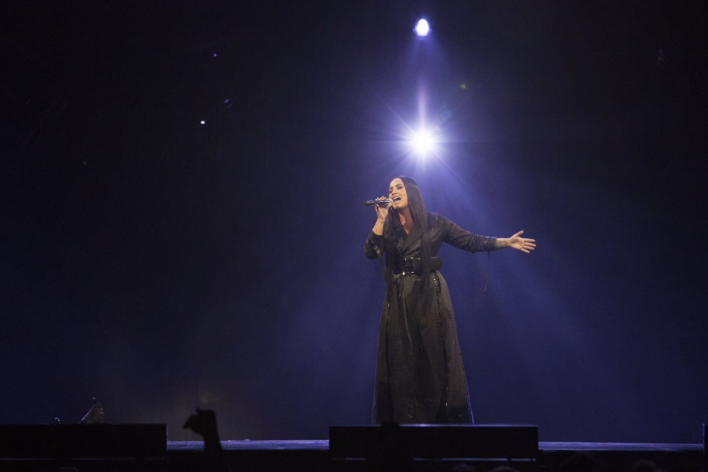 Demi Lovato sings from her album 'Tell Me You Love Me,' which was released in September 2017, during her show at Target Center on Saturday, March 10, 2018 in Minneapolis, Minn.