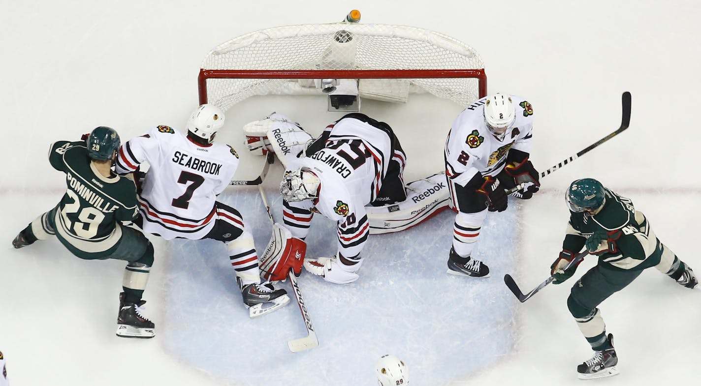 The Wild were denied a ruling on a goal in the second period when this puck came very close to crossing the line after being jammed by Minnesota Wild center Mikael Granlund (64) and then right wing Jason Pominville (29) Friday night at Xcel Energy Center in St. Paul. ] JEFF WHEELER &#x201a;&#xc4;&#xa2; jeff.wheeler@startribune.com The Minnesota Wild beat the Chicago Blackhawks 4-2 in game 4 of their playoff series Friday night, May 9, 2014 at Xcel Energy Center in St. Paul.