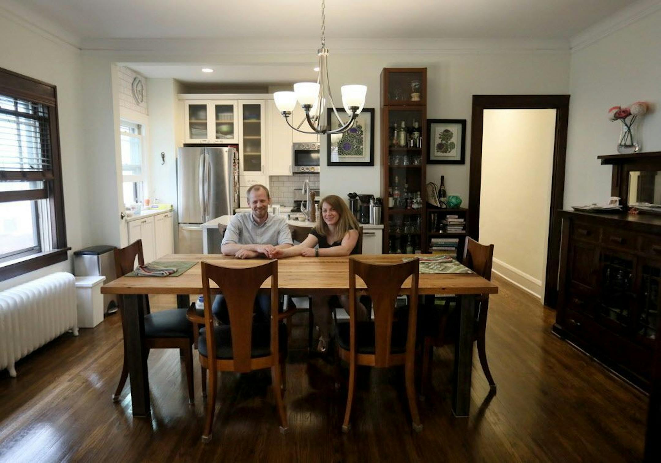 Their condo features some of its original woodwork -- and a kitchen with new appliances.