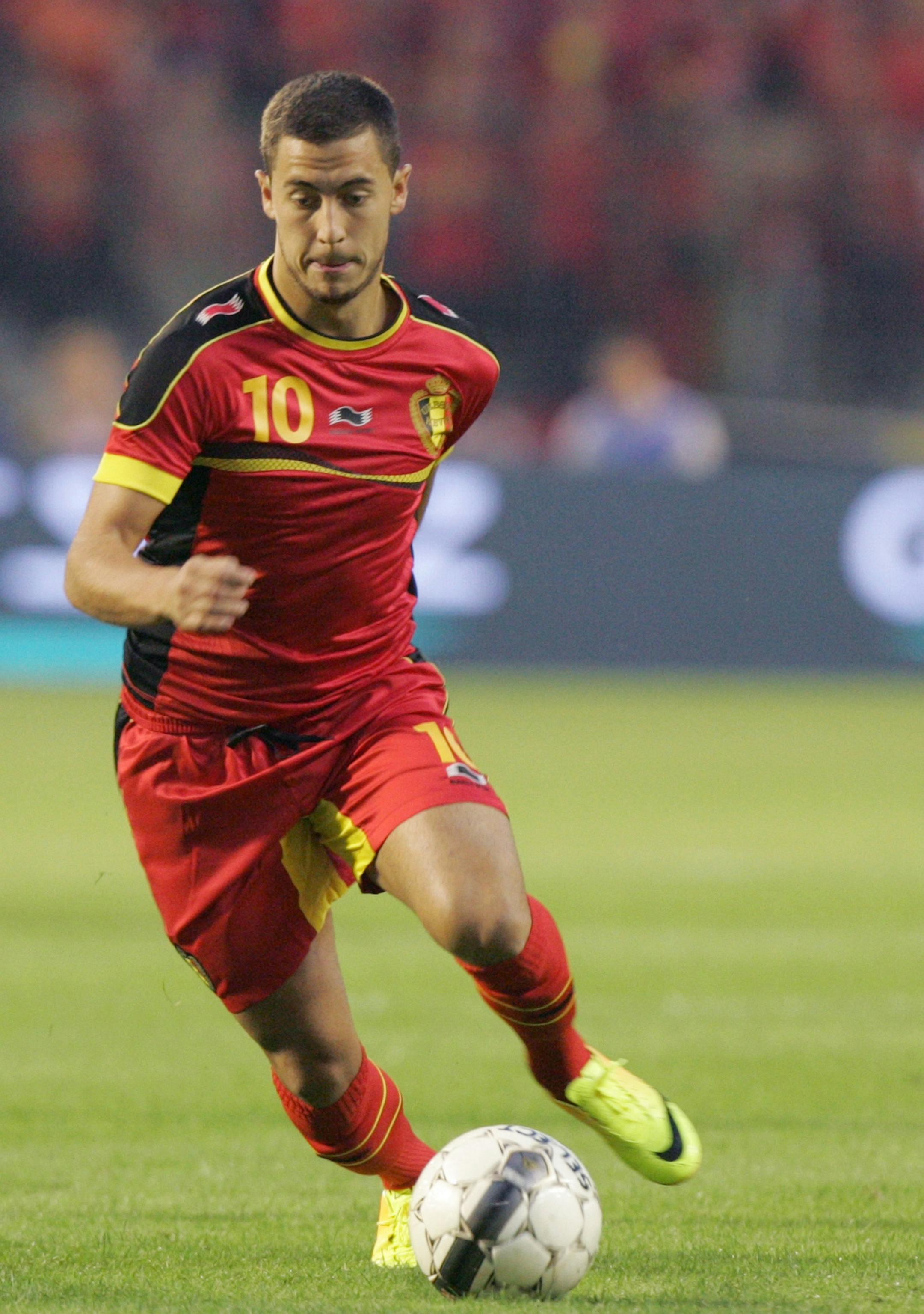 Belgium's Eden Hazard runs with the ball during a friendly soccer match between Belgium and France at the King Baudouin stadium in Brussels, Wednesday, Aug. 14, 2013. (AP Photo/Francois Walschaerts) ORG XMIT: OTK14