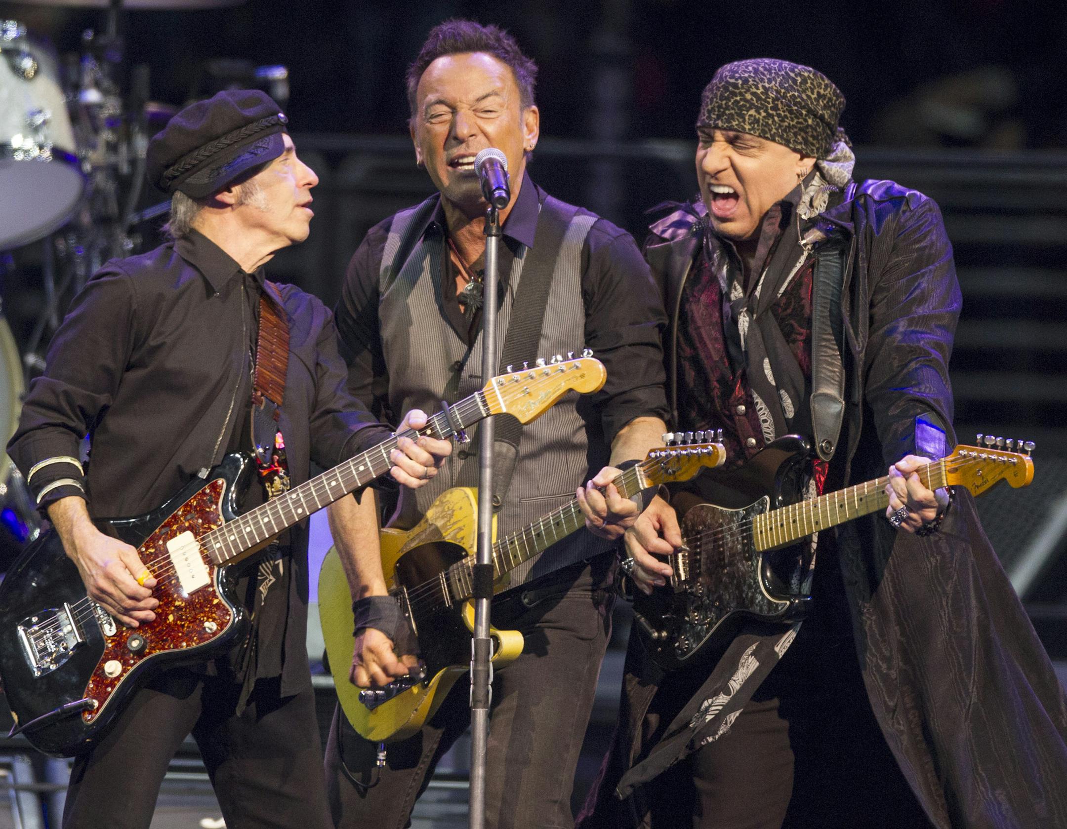 Bruce Springsteen & The E Street Band bring "The River Tour" to Philadelphia at the Wells Fargo Center on Friday, Feb. 12, 2016. From left, Nils Lofgren, Bruce Springsteen and Steven Van Zandt come together.