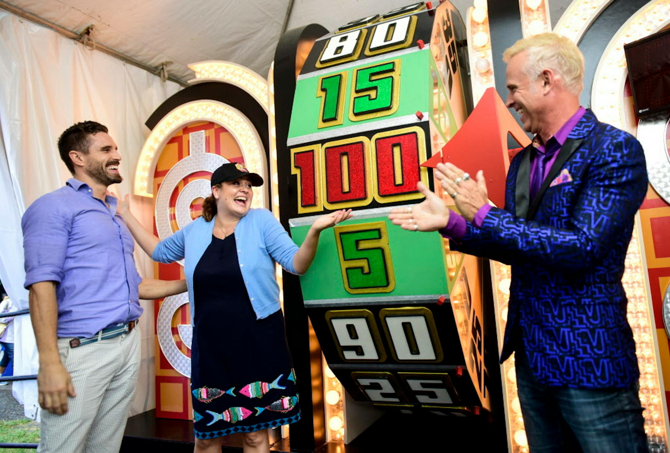 Brooklyn Park native Angelica McDaniel, head of CBS daytime programming spun the wheel with "The Price is Right" stars James O'Halloran (left) and George Gray at the Minnesota State Fair.