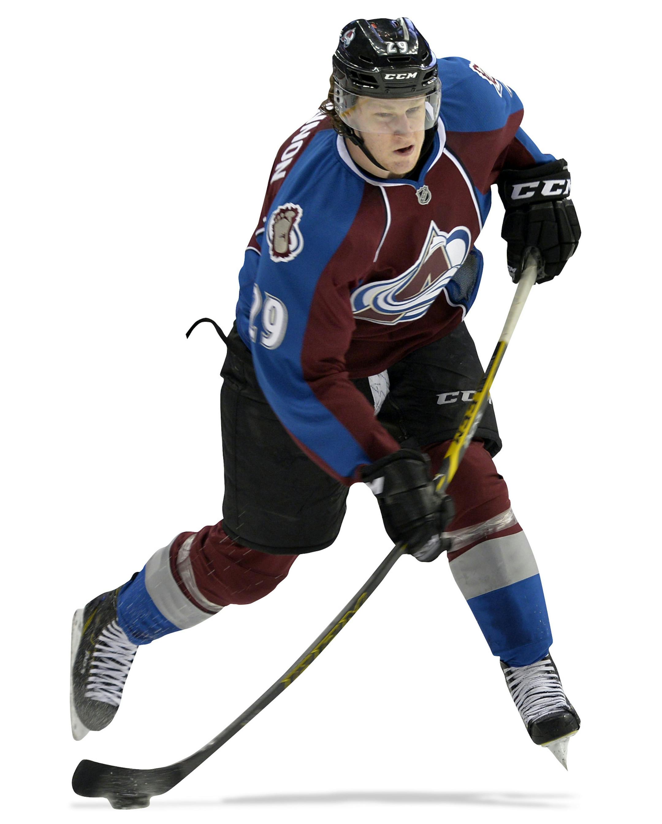Colorado Avalanche center Nathan MacKinnon takes a shot on goal against the Phoenix Coyotes during the first period of an NHL hockey game on Friday, Feb. 28, 2014, in Denver. (AP Photo/Jack Dempsey) ORG XMIT: COJD101
