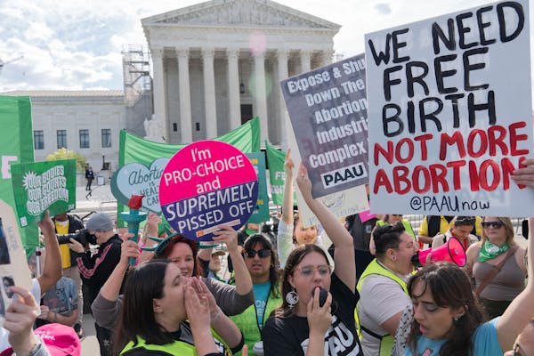 Anti-Abortion and Abortion-rights activists rally outside the Supreme Court, Wednesday, April 24, 2024, in Washington.