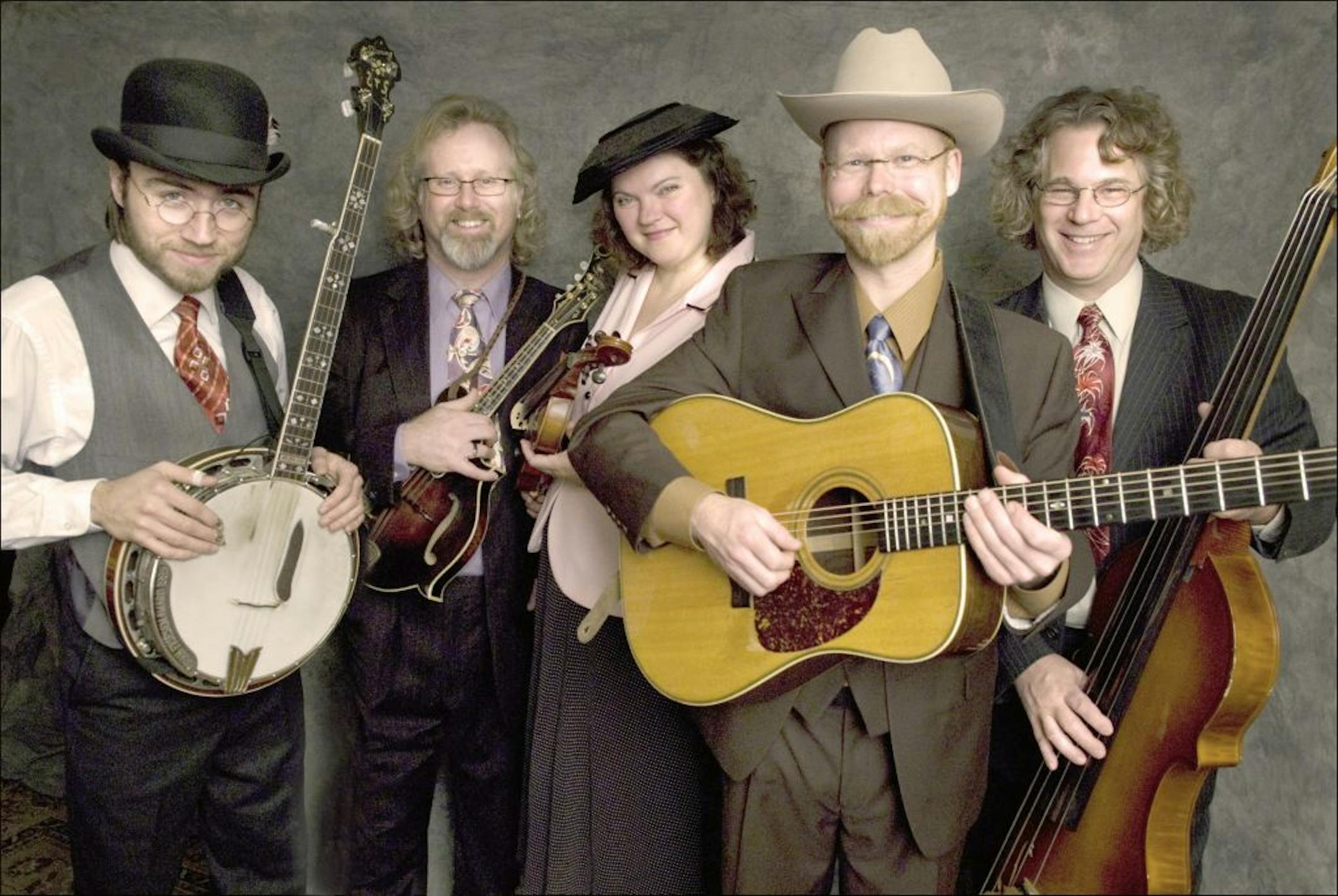 Monroe Crossing: Benji Flaming, banjo; Matt Thompson, mandolin; Lisa Fuglie, fiddle; Derek Johnson, guitar; Mark Anderson, bass. 2011 photo