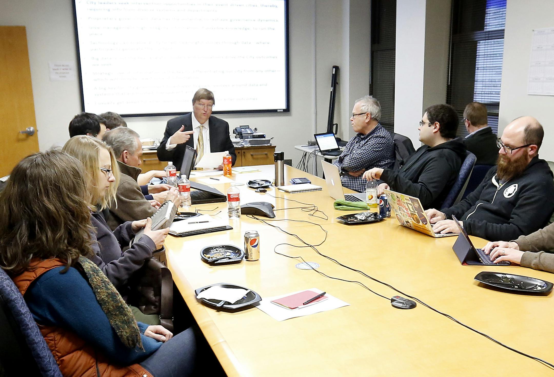 Otto Doll, at head of table above, invited a group of the civic tech community to his office recently to talk about what the city’s open data policy should look like. Doll is the chief information officer for the city of Minneapolis.