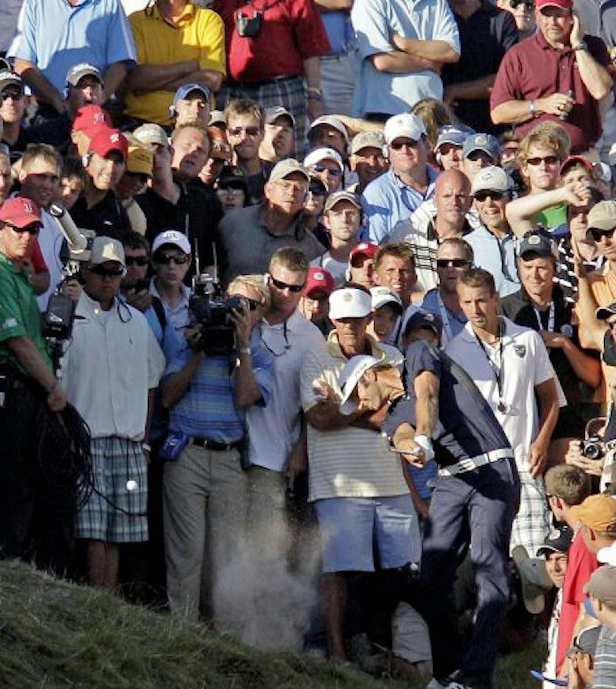 Dustin Johnson hits out of a bunker on the 18th hole during the final round of the PGA Championship golf tournament Sunday, Aug. 15, 2010, at Whistling Straits in Haven, Wis. Johnson was later assessed a two-stroke penalty for grounding his club in a bunker on the hole.