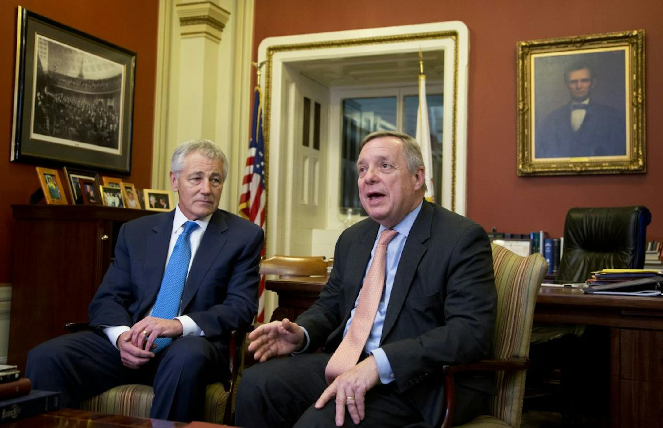 Chuck Hagel, left, a Republican nominated to be defense secretary, met with Sen. Dick Durbin, D-Ill., on Tuesday.