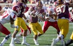 Gophers defensive back Antonio Shenault showed some moves returning an interception during the third quarter Saturday. He also had seven tackles.