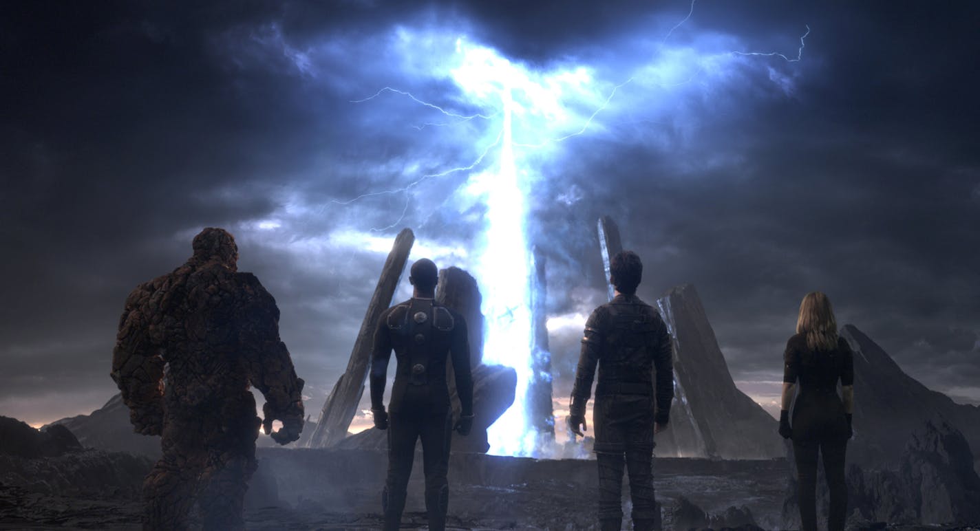 This photo provided by courtesy Twentieth Century Fox shows, The Thing, from left, Michael B. Jordan as Johnny Storm, Miles Teller as Dr. Reed Richards, and Kate Mara as Sue Storm, in a scene from the film, "Fantastic Four," releasing in U.S. theaters on Aug. 7, 2015. The Fox panel is on Saturday, July 11, 2015, at the San Diego Convention Center during the Comic-Con International. (Twentieth Century Fox via AP)