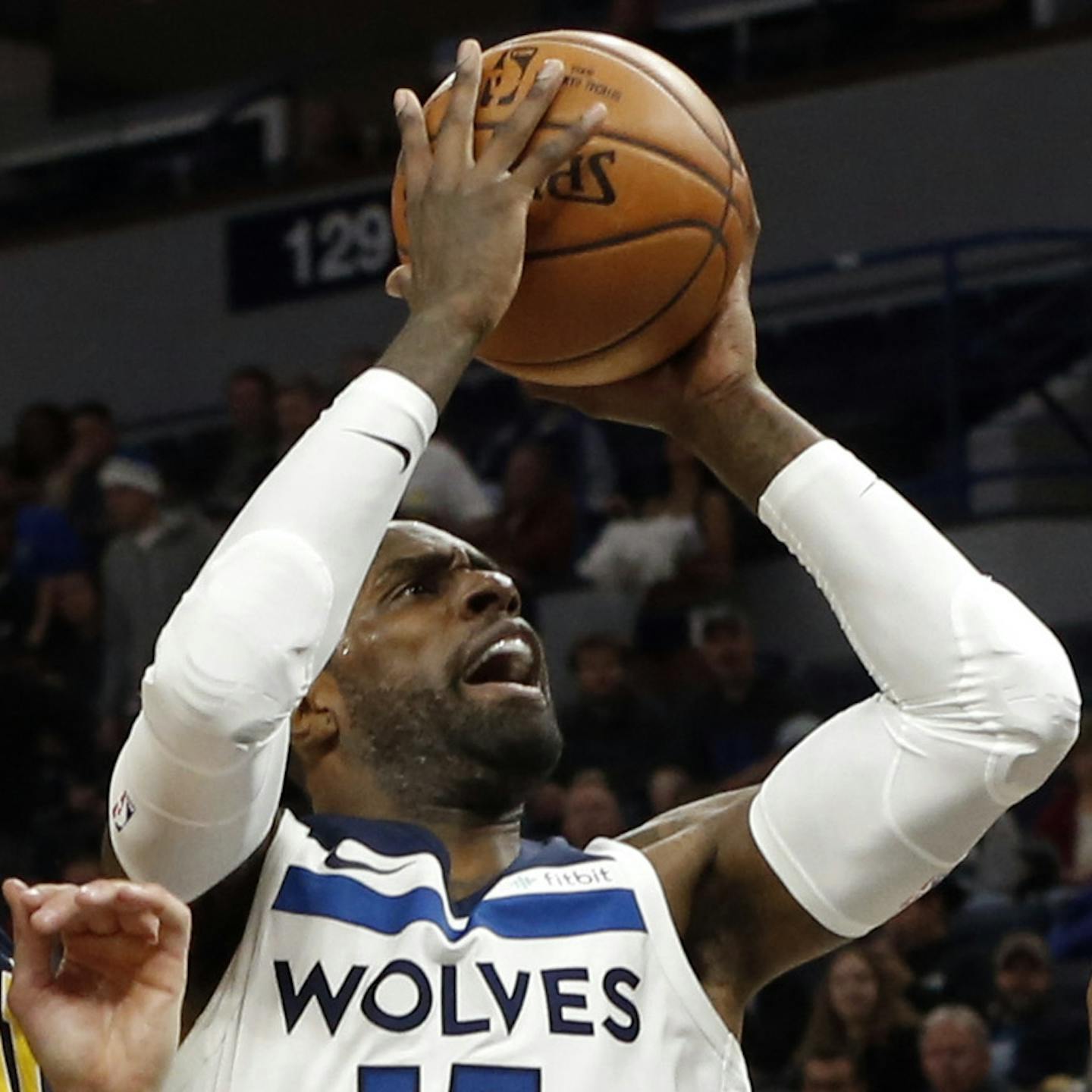 Minnesota Timberwolves' Shabazz Muhammad, center eyes the basket as Indiana Pacers' Domantas Sabonis, left, of Lithuania, and Indiana Pacers' Thaddeus Young defend during the first half of an NBA basketball game Tuesday, Oct. 24, 2017, in Minneapolis. (AP Photo/Jim Mone) ORG XMIT: MIN2017120817411805