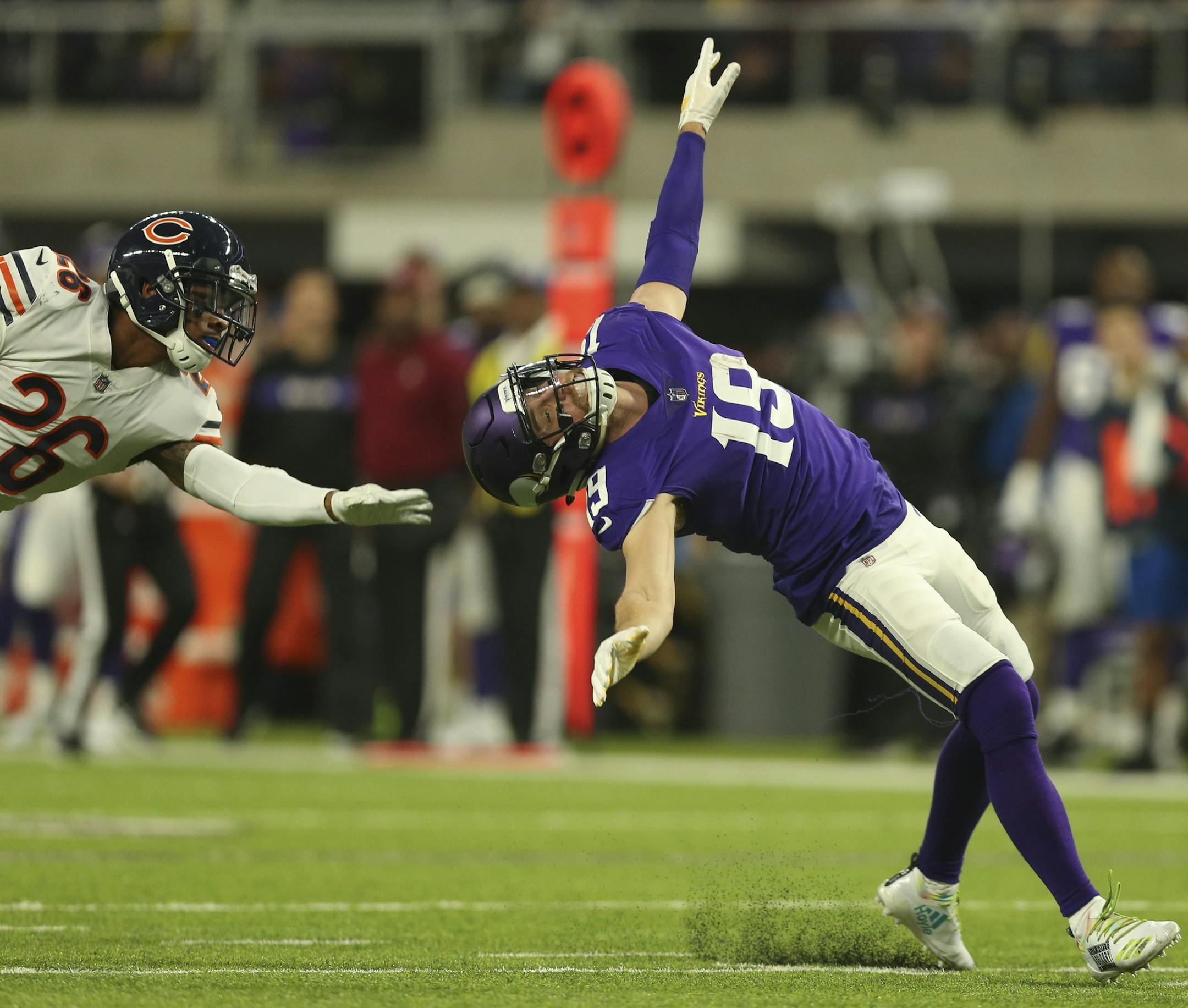 Chicago Bears defensive back Deon Bush (26) was called for a facemask penalty on Minnesota Vikings wide receiver Adam Thielen (19), helping set up a late second quarter field goal. ] JEFF WHEELER • jeff.wheeler@startribune.com The Minnesota Vikings faced the Chicago Bears in an NFL football game Sunday afternoon, December 30, 2018 at U.S. Bank Stadium in Minneapolis.